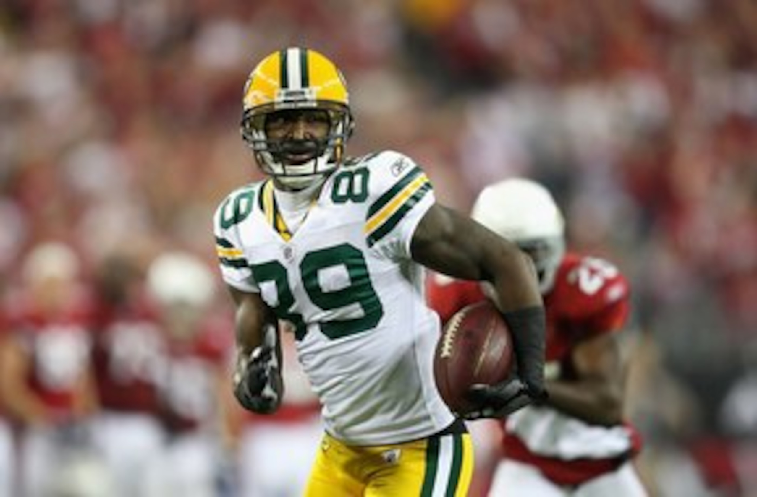 GLENDALE, AZ - JANUARY 10:  Wide receiver James Jones #89 of the Green Bay Packers runs with the football during the 2010 NFC wild-card playoff game against the Arizona Cardinals at the Universtity of Phoenix Stadium on January 10, 2010 in Glendale, Arizo