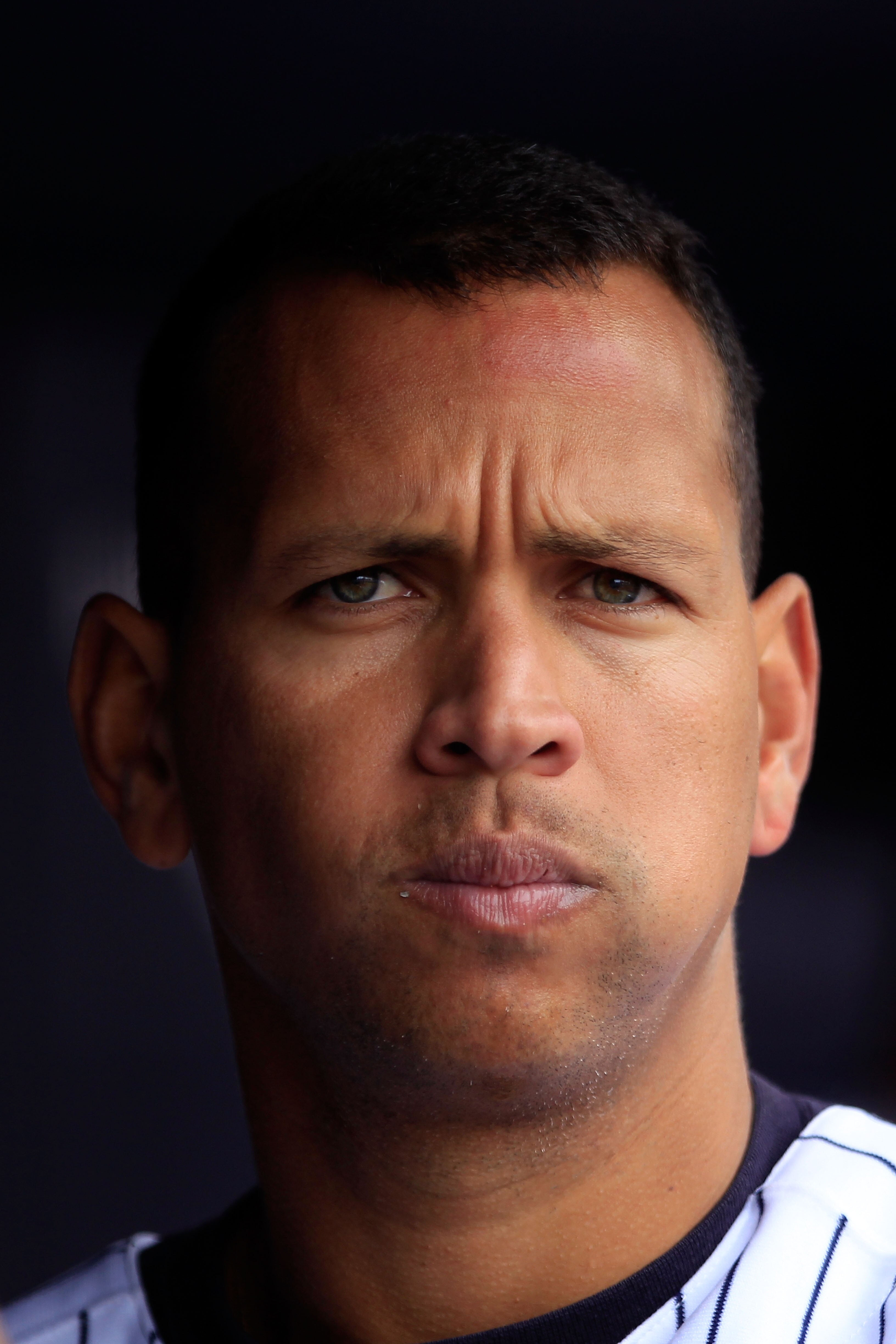 NEW YORK, NY - MAY 01:  Alex Rodriguez #13 of the New York Yankees looks on from the dugout during the game against the Toronto Blue Jays at Yankee Stadium on May 1, 2011 in the Bronx borough of New York City. The Yankees defeated the Blue Jays 5-2.  (Pho