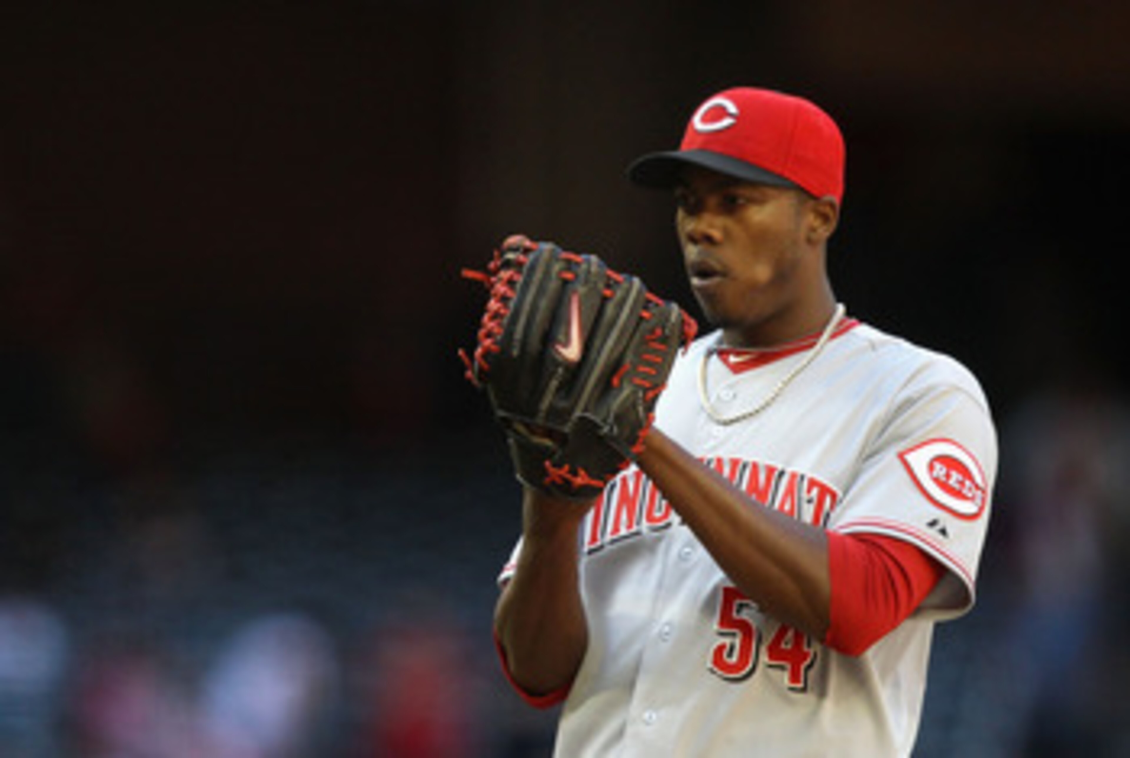 PHOENIX, AZ - APRIL 10: Relief pitcher Aroldis Chapman #54 of the Cincinnati Reds pitches against the Arizona Diamondbacks during the Major League Baseball game at Chase Field on April 10, 2011 in Phoenix, Arizona. The Diamondbacks defeated the Reds 10-8 PHOENIX, AZ - APRIL 10: Relief pitcher Aroldis Chapman #54 of the Cincinnati Reds pitches against the Arizona Diamondbacks during the Major League Baseball game at Chase Field on April 10, 2011 in Phoenix, Arizona. The Diamondbacks defeated the Reds 10-8