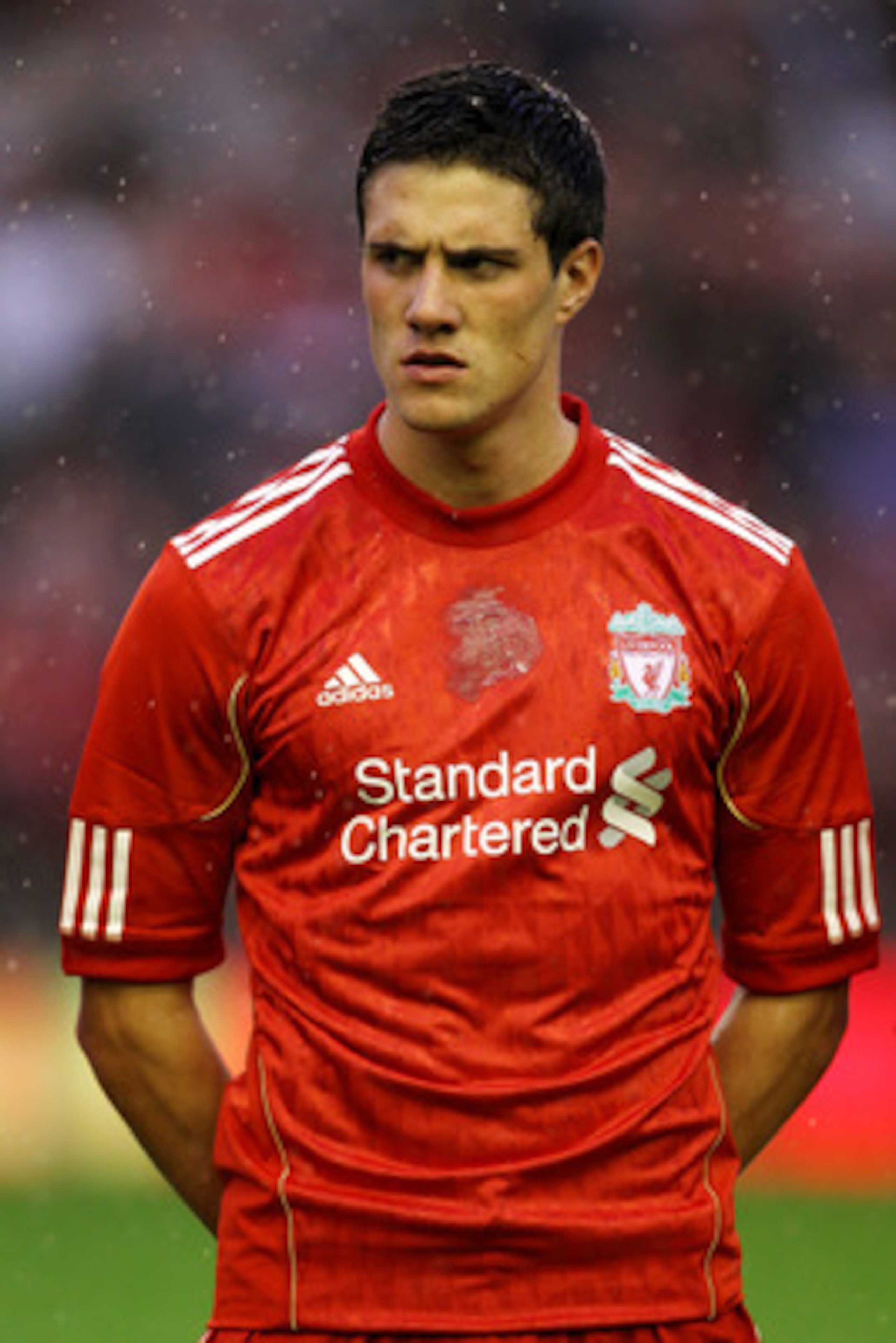 LIVERPOOL, ENGLAND - AUGUST 19:  Martin Kelly of Liverpool looks on prior to the UEFA Europa League play-off first leg match beteween Liverpool and Trabzonspor at Anfield on August 19, 2010 in Liverpool, England.  (Photo by Alex Livesey/Getty Images)