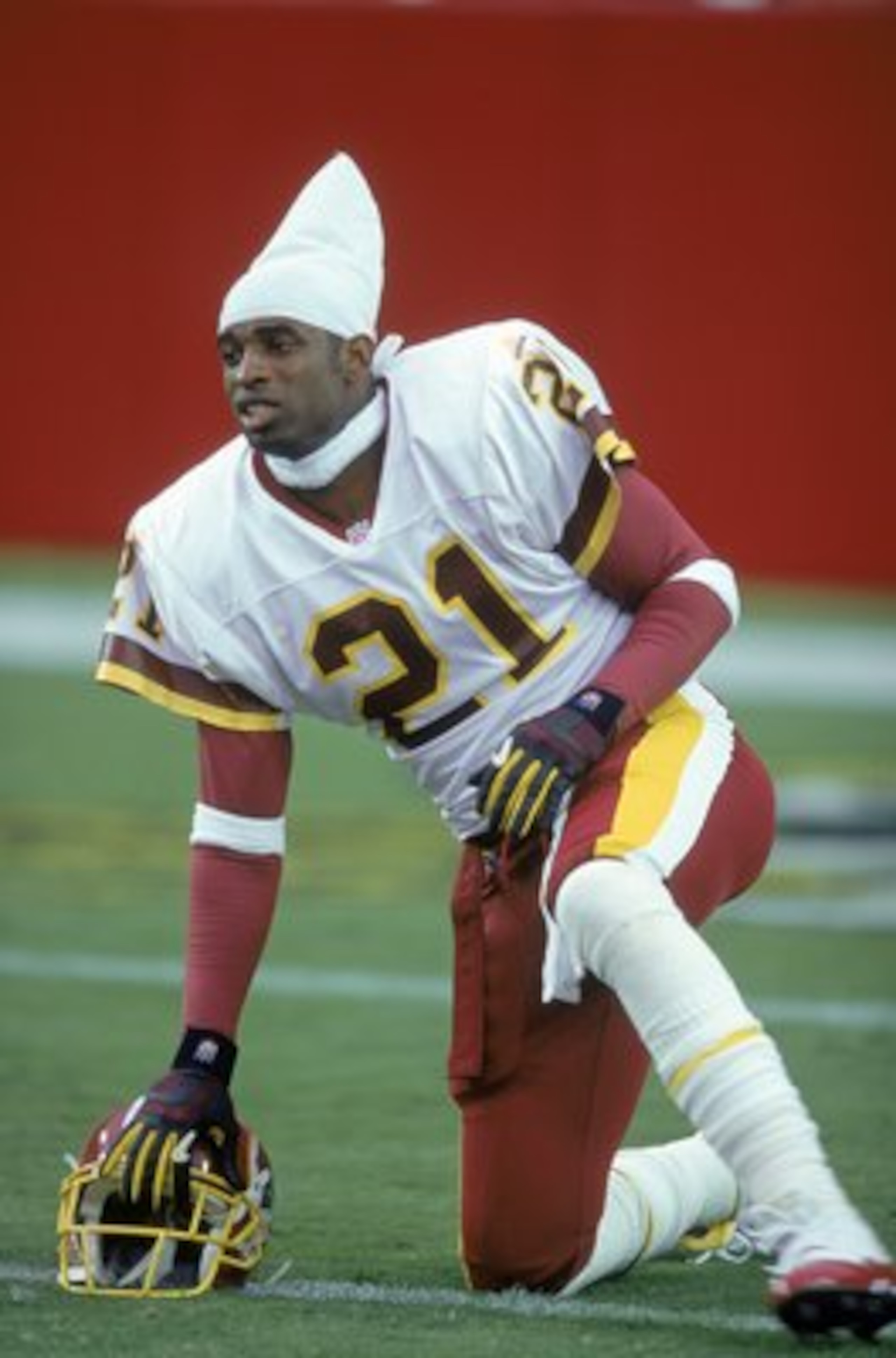 12 Aug 2000: Deion Sanders #21 of the Washington Redskins stretches out on the field before the game against the New England Patriots at the FedEx Field in Landover, Maryland.  The Redskins defeated the Patriots 30-20.Mandatory Credit: Doug Pensinger  /Al