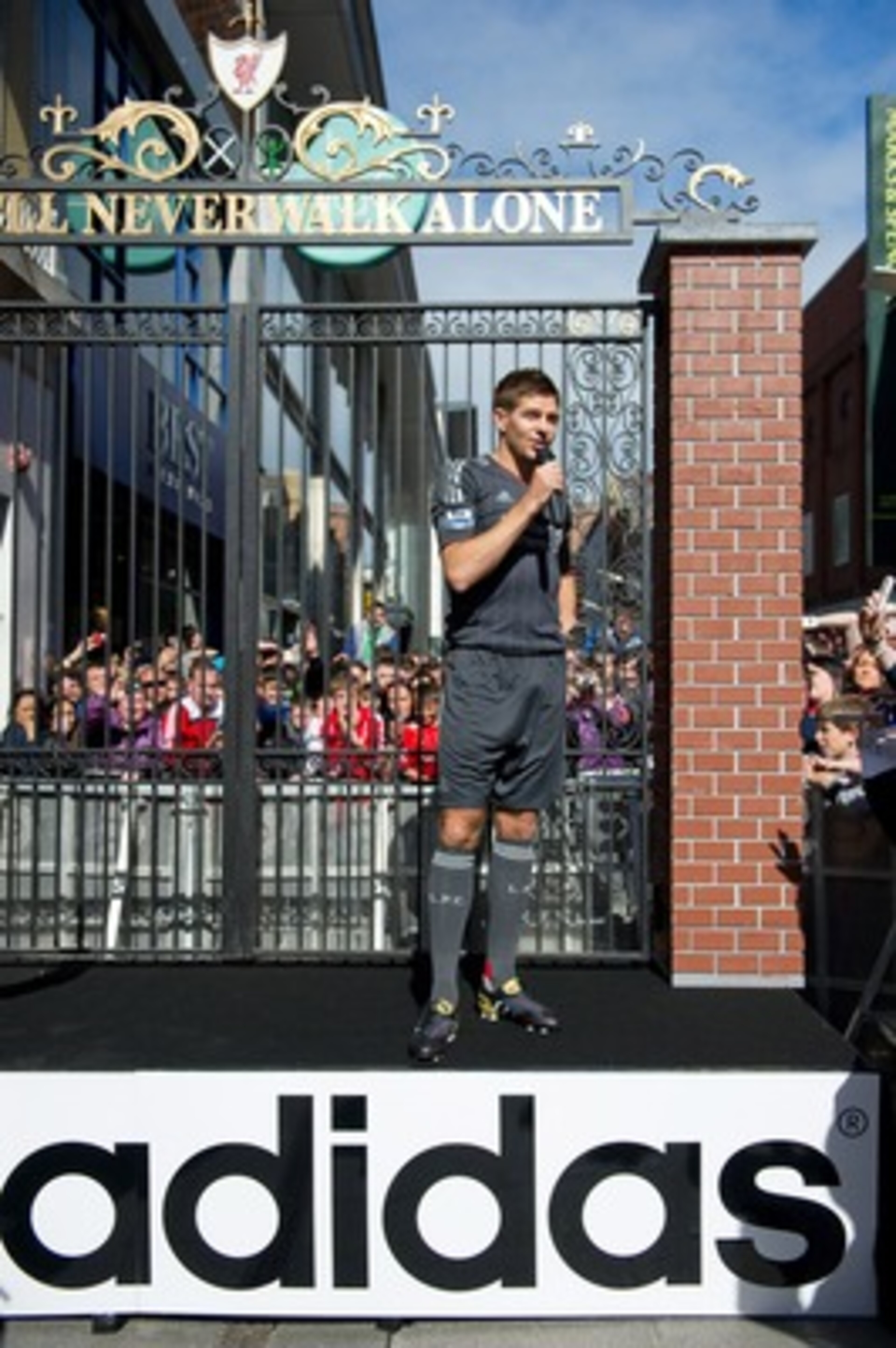 DUBLIN, IRELAND - MAY 12:  Steven Gerrard of Liverpool FC speaks to fans at the launch the new Liverpool away kit in front of the Shankly Gates. as adidas bring iconic pieces from Liverpool FC to the city on May 12, 2001 in Dublin, Ireland.  (Photo by adi