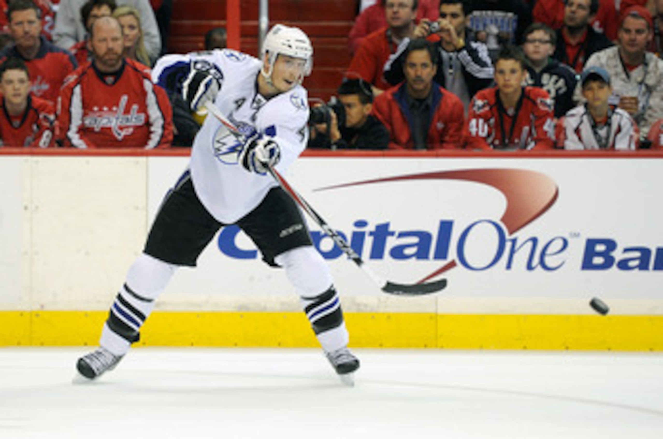 WASHINGTON, DC - MAY 01:  Vincent Lecavalier #4 of the Tampa Bay Lightning passes the puck during the game against the Washington Capitals in Game Two of the Eastern Conference Semifinal during the 2011 NHL Stanley Cup Playoffs at the Verizon Center on Ma