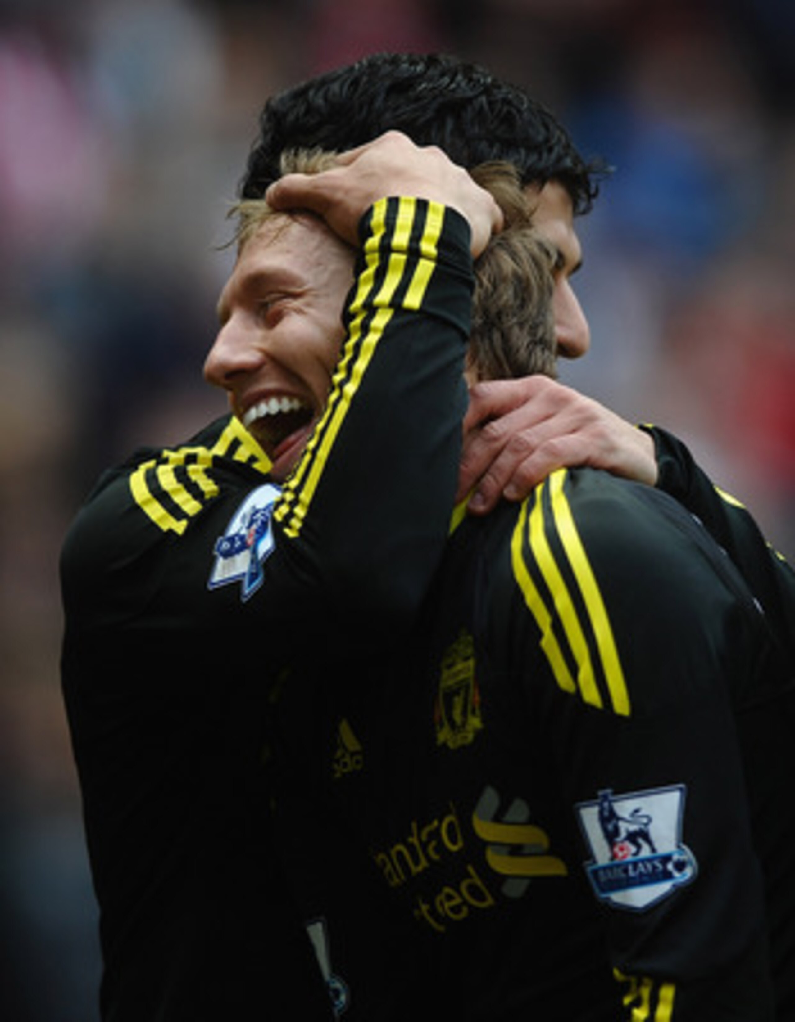 SUNDERLAND, ENGLAND - MARCH 20: Luis Suarez of Liverpool celebrates his goal with Lucas Leiva during the Barclays Premier League match between Sunderland and Liverpool at the Stadium of Light on March 20, 2011 in Sunderland, England.  (Photo by Laurence G