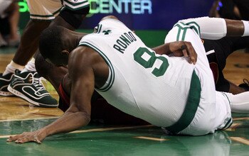 BOSTON, MA - MAY 07: Rajon Rondo #9 of the Boston Celtics injures his arm as he lands on the court after a scramble with Dwyane Wade #3 of the Miami Heat in Game Three of the Eastern Conference Semifinals in the 2011 NBA Playoffs on May 7, 2011 at the TD BOSTON, MA - MAY 07: Rajon Rondo #9 of the Boston Celtics injures his arm as he lands on the court after a scramble with Dwyane Wade #3 of the Miami Heat in Game Three of the Eastern Conference Semifinals in the 2011 NBA Playoffs on May 7, 2011 at the TD