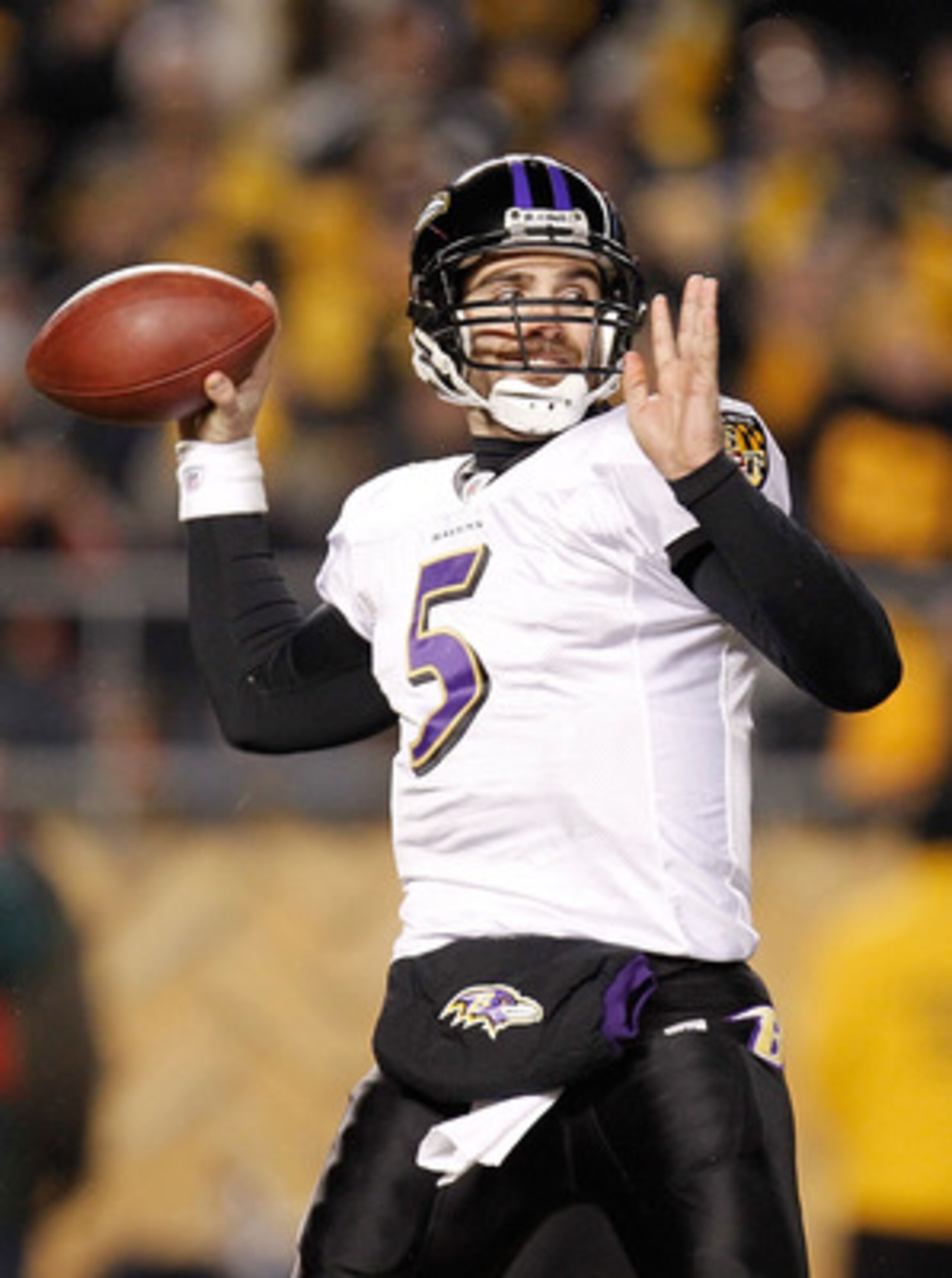 PITTSBURGH, PA - JANUARY 15:  Quarterback Joe Flacco #5 of the Baltimore Ravens looks to pass against the Pittsburgh Steelers in the AFC Divisional Playoff Game at Heinz Field on January 15, 2011 in Pittsburgh, Pennsylvania.  (Photo by Gregory Shamus/Gett