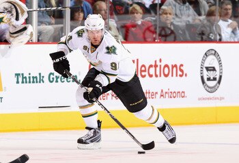 GLENDALE, AZ - MARCH 29:  Brad Richards #91 of the Dallas Stars skates with the puck during the NHL game against the Phoenix Coyotes at Jobing.com Arena on March 29, 2011 in Glendale, Arizona. The Coyotes defeated the Stars 2-1 in an overtime shoot out.  