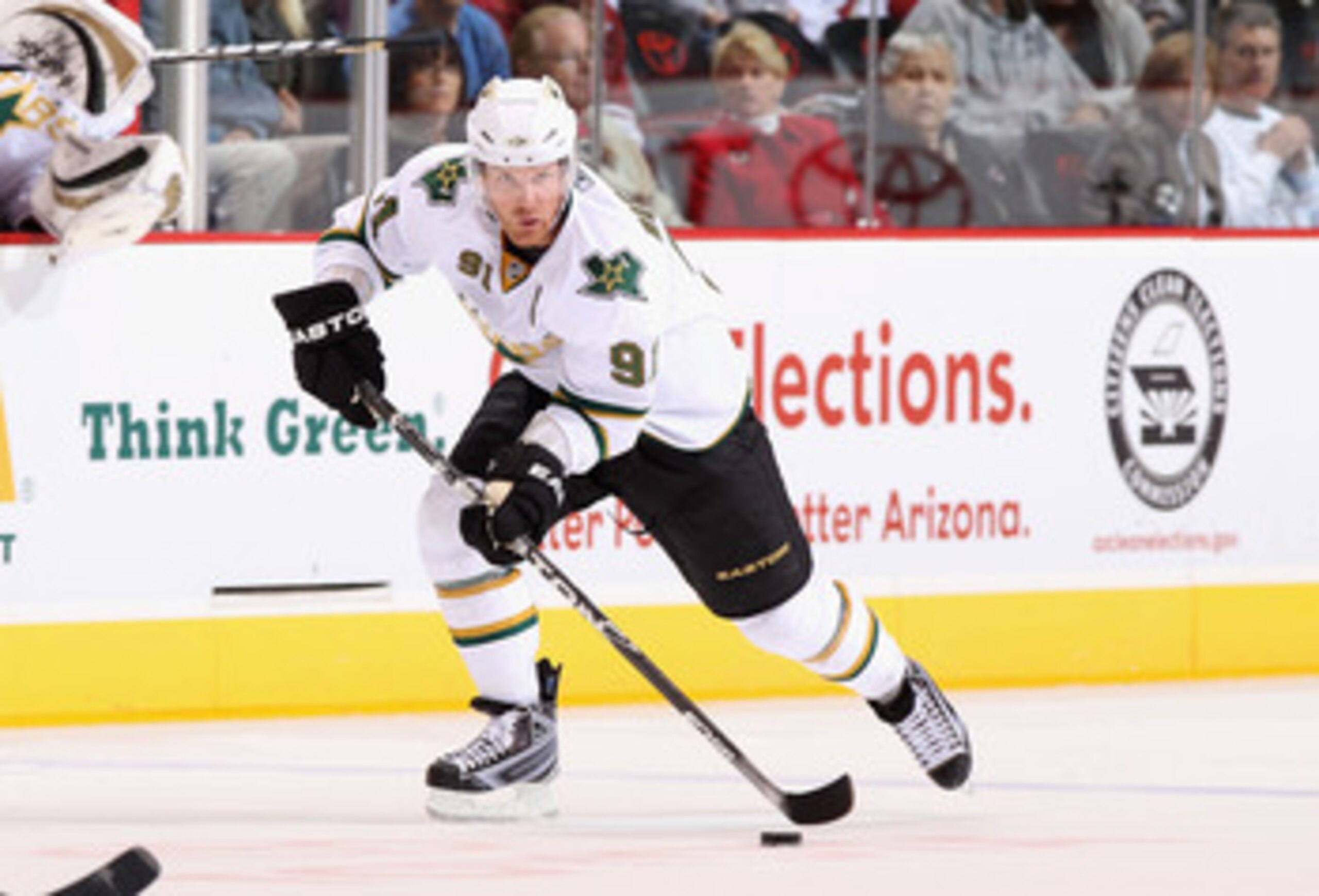 GLENDALE, AZ - MARCH 29:  Brad Richards #91 of the Dallas Stars skates with the puck during the NHL game against the Phoenix Coyotes at Jobing.com Arena on March 29, 2011 in Glendale, Arizona. The Coyotes defeated the Stars 2-1 in an overtime shoot out.  