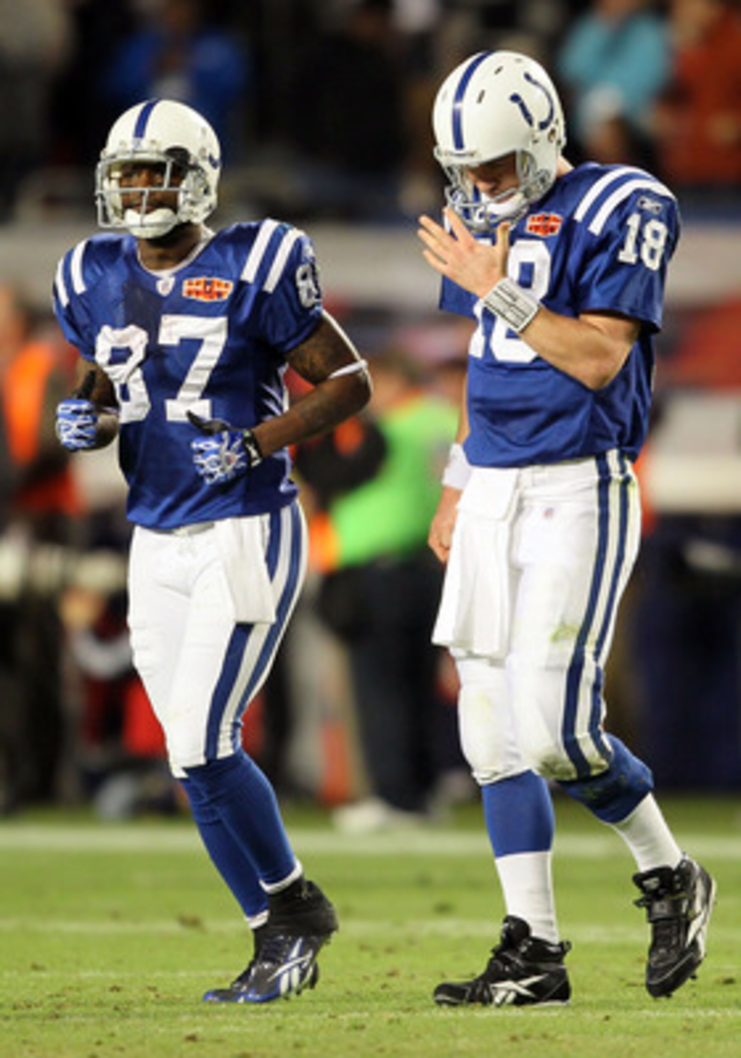 MIAMI GARDENS, FL - FEBRUARY 07: Peyton Manning #18 of the Indianapolis Colts reacts after a play late in the fourth quarter with teammate Reggie Wayne #87 against the New Orleans Saints during Super Bowl XLIV on February 7, 2010 at Sun Life Stadium in Mi