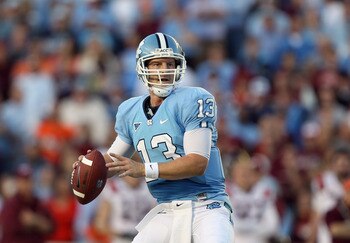 CHAPEL HILL, NC - NOVEMBER 13:  T.J. Yates #13 of the North Carolina Tar Heels drops back to throw a pass against the Virginia Tech Hokies during their game at Kenan Stadium on November 13, 2010 in Chapel Hill, North Carolina.  (Photo by Streeter Lecka/Ge