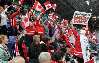 VANCOUVER, BC - FEBRUARY 15:  David Ash of Winnipeg cheers on his team prior to the Women's preliminary game between Switzerland and Canada on day 4 of the Vancouver 2010 Winter Olympics at the UBC Thunderbird Arena on February 15, 2010 in Vancouver, Cana