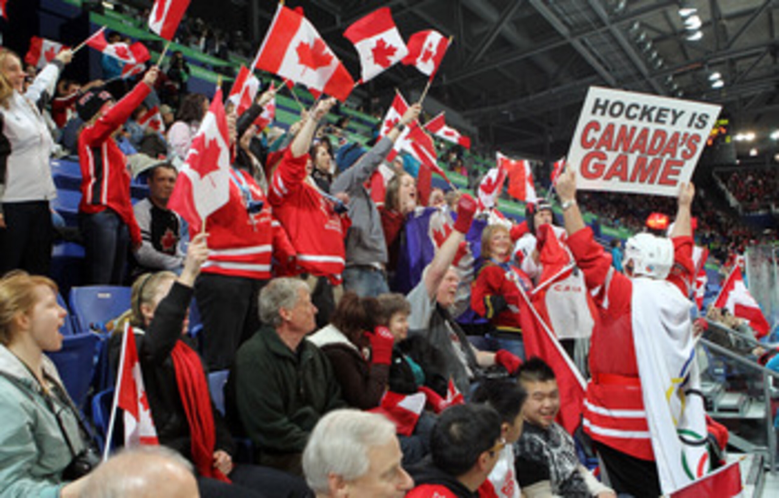 VANCOUVER, BC - FEBRUARY 15:  David Ash of Winnipeg cheers on his team prior to the Women's preliminary game between Switzerland and Canada on day 4 of the Vancouver 2010 Winter Olympics at the UBC Thunderbird Arena on February 15, 2010 in Vancouver, Cana
