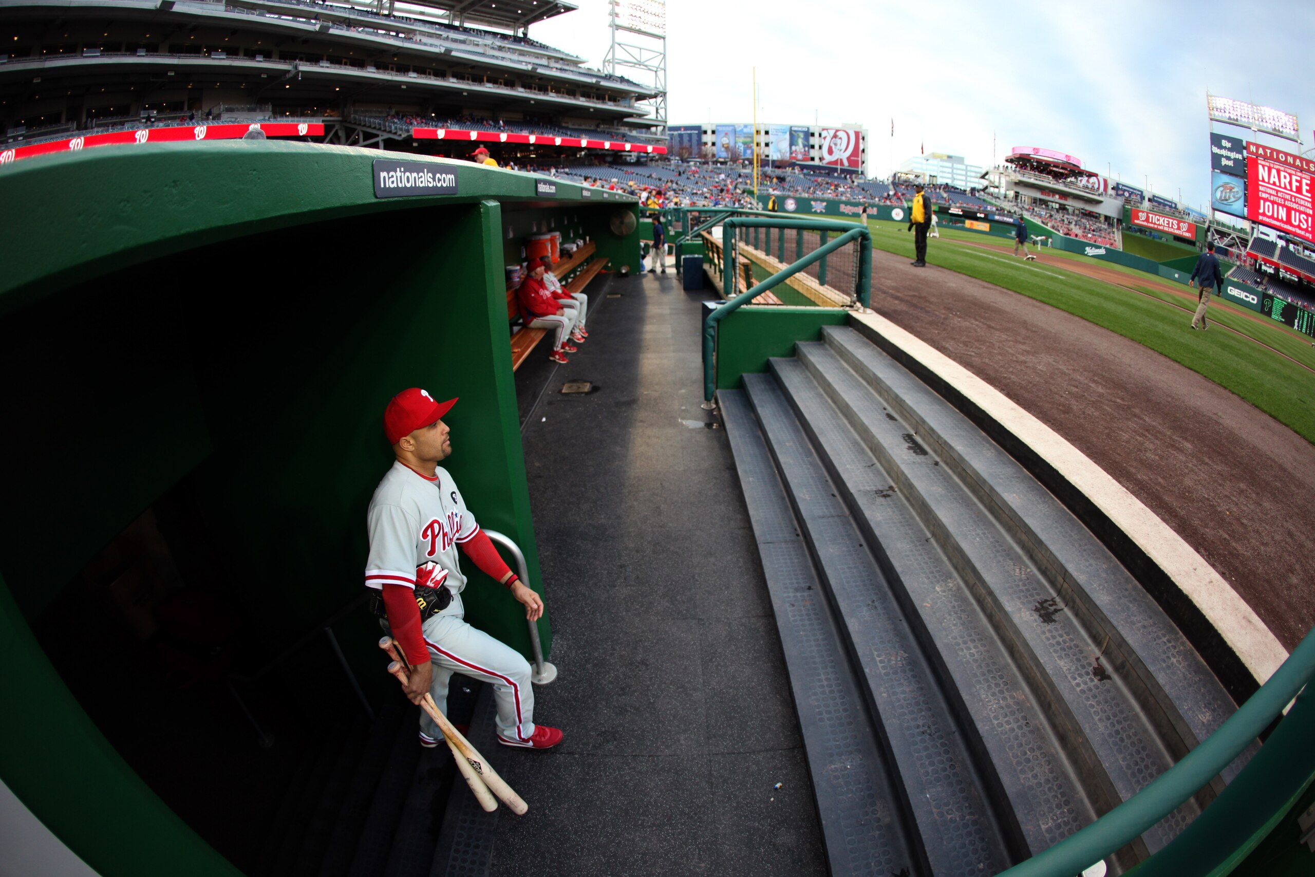 WASHINGTON, DC - APRIL 13:  Placido Polanco #27 of the Philadelphia Phillies enters the dugout before the start of the Phillies game against the Washington Nationals at Nationals Park on April 13, 2011 in Washington, DC.  (Photo by Rob Carr/Getty Images)
