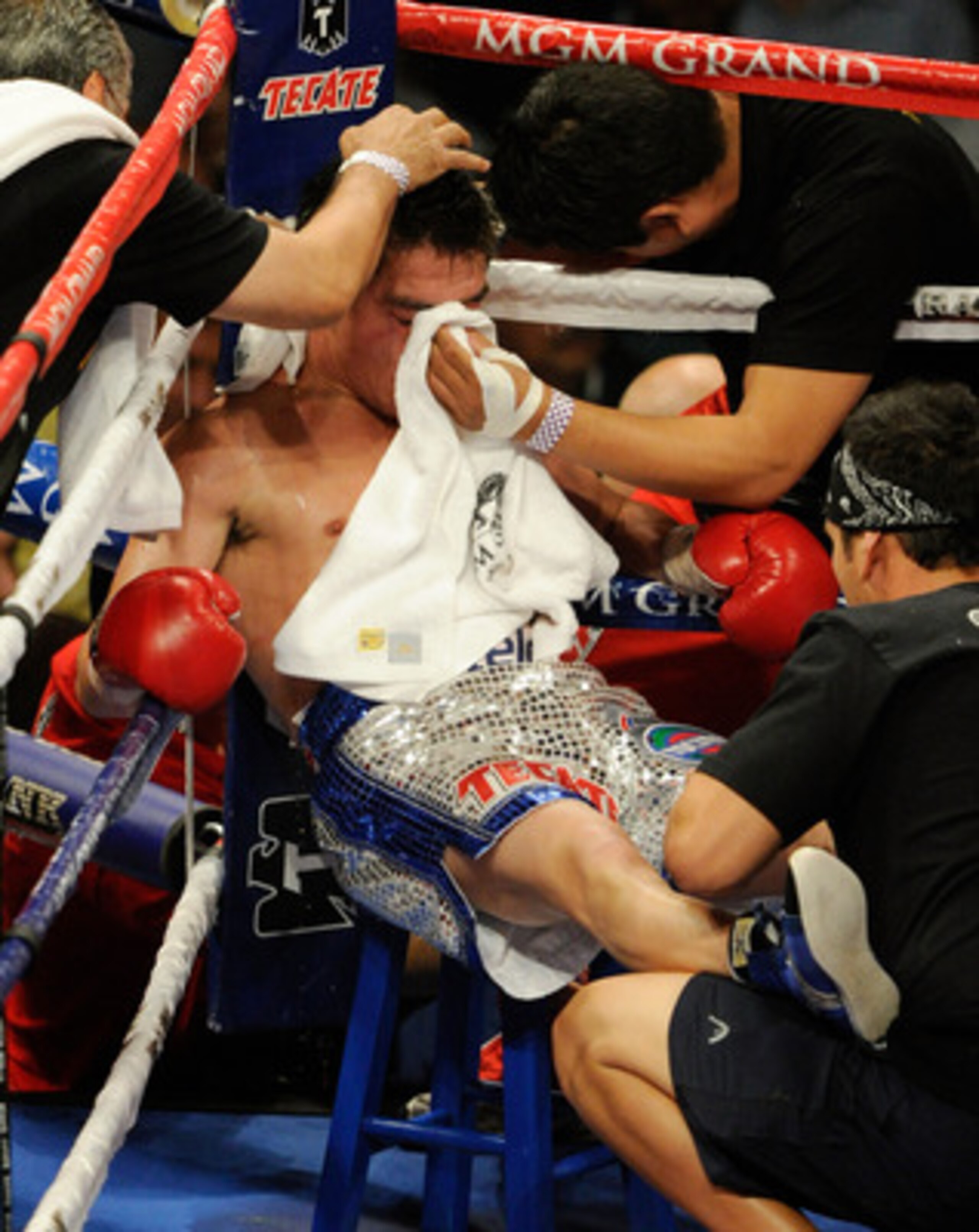 LAS VEGAS, NV - MAY 07:  Jorge Arce is tended to in his corner between rounds during his WBO super bantamweight title fight against Wilfredo Vazquez at the MGM Grand Garden Arena May 7, 2011 in Las Vegas, Nevada. Arce won by 12th-round TKO.  (Photo by Eth