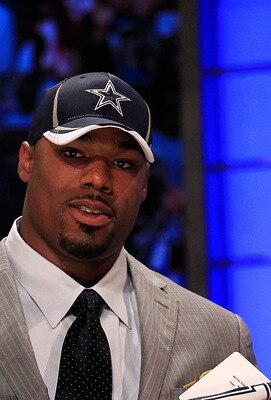 NEW YORK, NY - APRIL 28: Tyron Smith, #9 overall pick by the Dallas Cowboys, holds up a jersey on stage during the 2011 NFL Draft at Radio City Music Hall on April 28, 2011 in New York City. (Photo by Chris Trotman/Getty Images) NEW YORK, NY - APRIL 28: Tyron Smith, #9 overall pick by the Dallas Cowboys, holds up a jersey on stage during the 2011 NFL Draft at Radio City Music Hall on April 28, 2011 in New York City. (Photo by Chris Trotman/Getty Images)