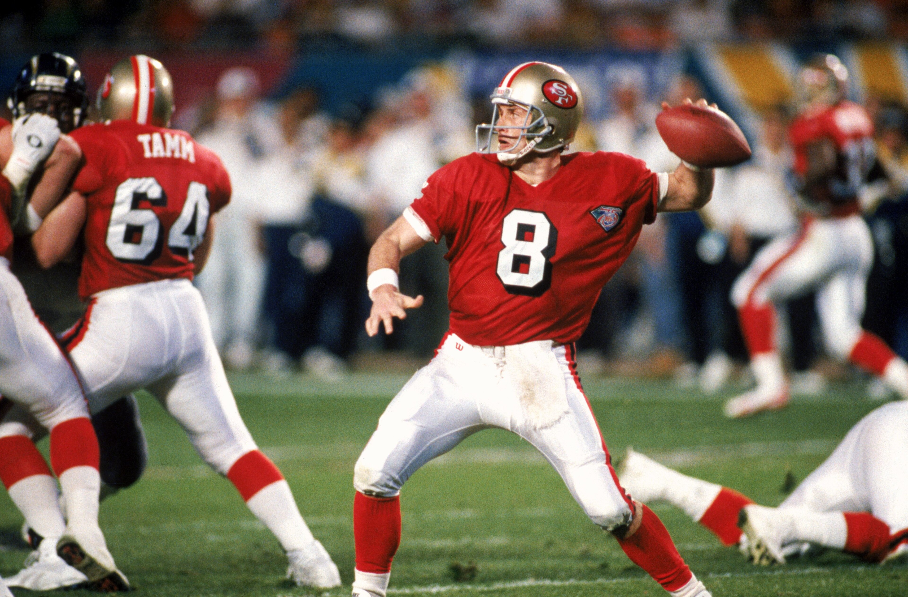 MIAMI - JANUARY 29:  Quarterback Steve Young #8 of the San Francisco 49ers drops back to pass during Super Bowl XXIX against the San Diego Chargers at Joe Robbie Stadium on January 29, 1995 in Miami, Florida. The 49ers won 49-26. (Photo by George Rose/Get