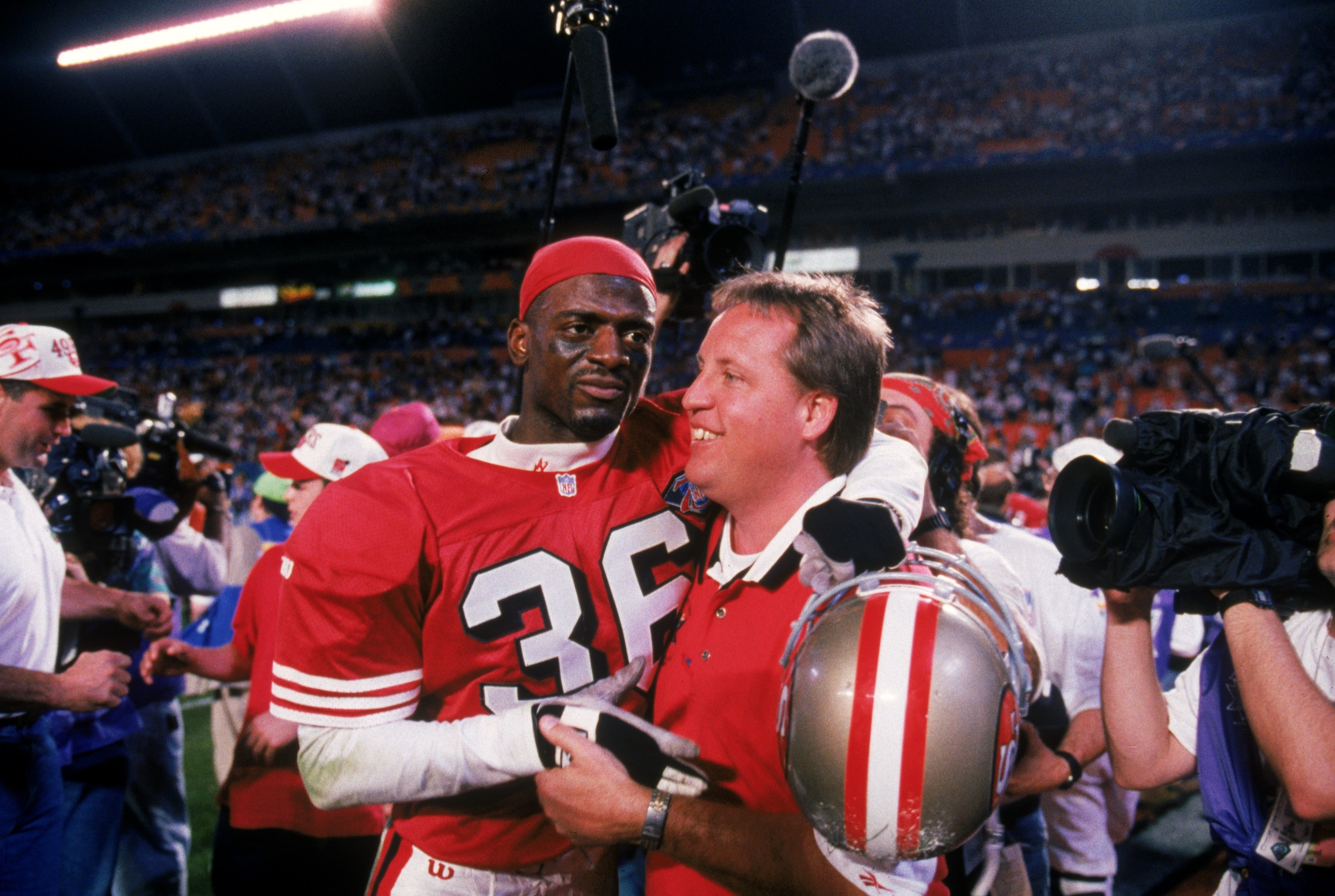 MIAMI - JANUARY 29: Cornerback Merton Hanks #36 of the San Francisco 49ers celebrates after defeating the San Diego Chargers in Super Bowl XXIX at Joe Robbie Stadium on January 29, 1995 in Miami, Florida. The 49ers won 49-26. (Photo by George Rose/Getty MIAMI - JANUARY 29: Cornerback Merton Hanks #36 of the San Francisco 49ers celebrates after defeating the San Diego Chargers in Super Bowl XXIX at Joe Robbie Stadium on January 29, 1995 in Miami, Florida. The 49ers won 49-26. (Photo by George Rose/Getty