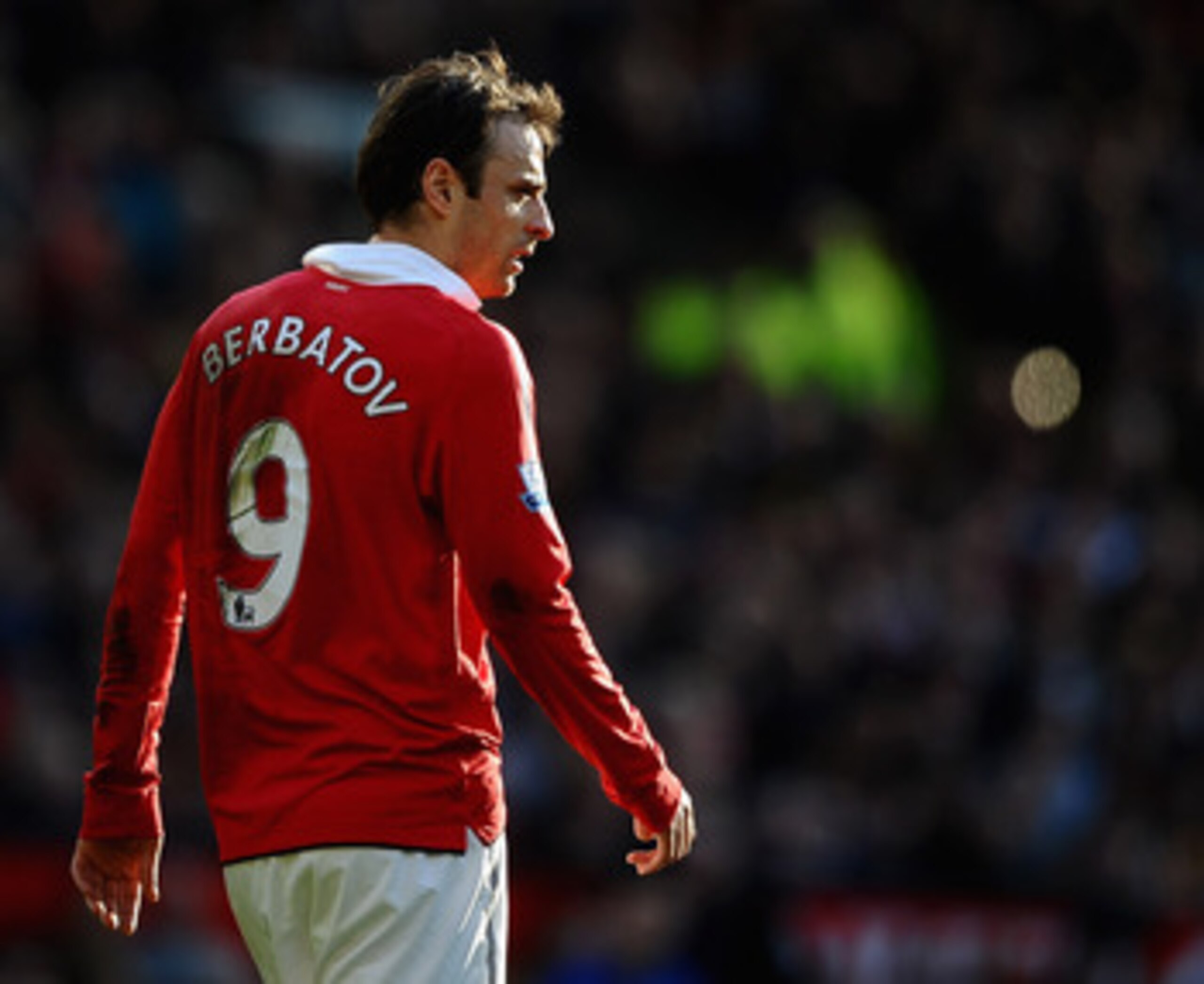 MANCHESTER, ENGLAND - MARCH 19: Dimatar Berbatov of Manchester United looks on during the Barclays Premier League match between Manchester United and Bolton Wanderers at Old Trafford on March 19, 2011 in Manchester, England.  (Photo by Laurence Griffiths/