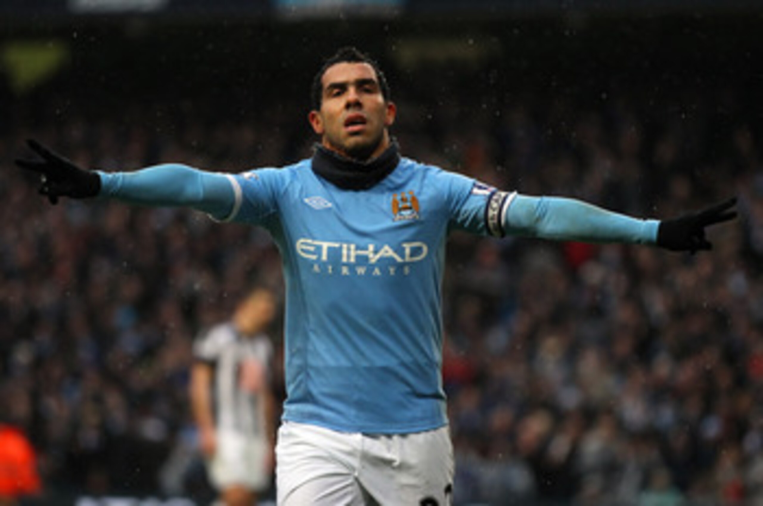 MANCHESTER, ENGLAND - FEBRUARY 05:  Carlos Tevez of Manchester City celebrates after scoring his third goal during the Barclays Premier League match between Manchester City and West Bromwich Albion at the City of Manchester Stadium on February 5, 2011 in