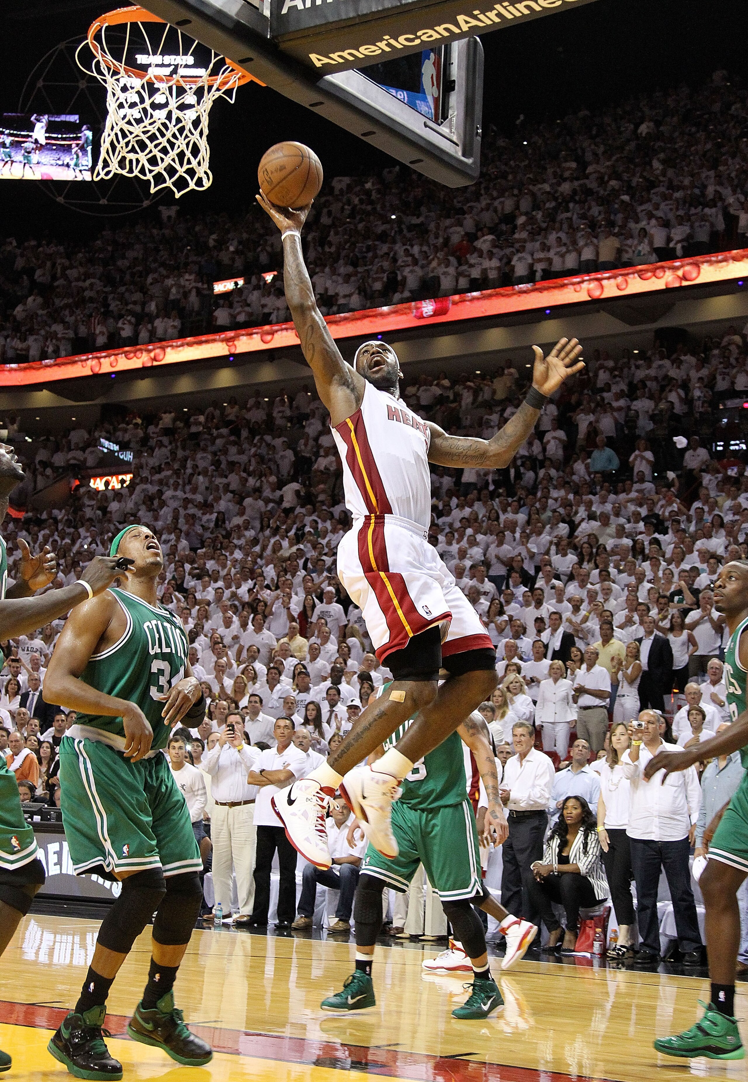 MIAMI, FL - MAY 11:  LeBron James #6 of the Miami Heat shoots over Paul Pierce #34 of the Boston Celtics during Game Five of the Eastern Conference Semifinals of the 2011 NBA Playoffs at American Airlines Arena on May 11, 2011 in Miami, Florida. NOTE TO U