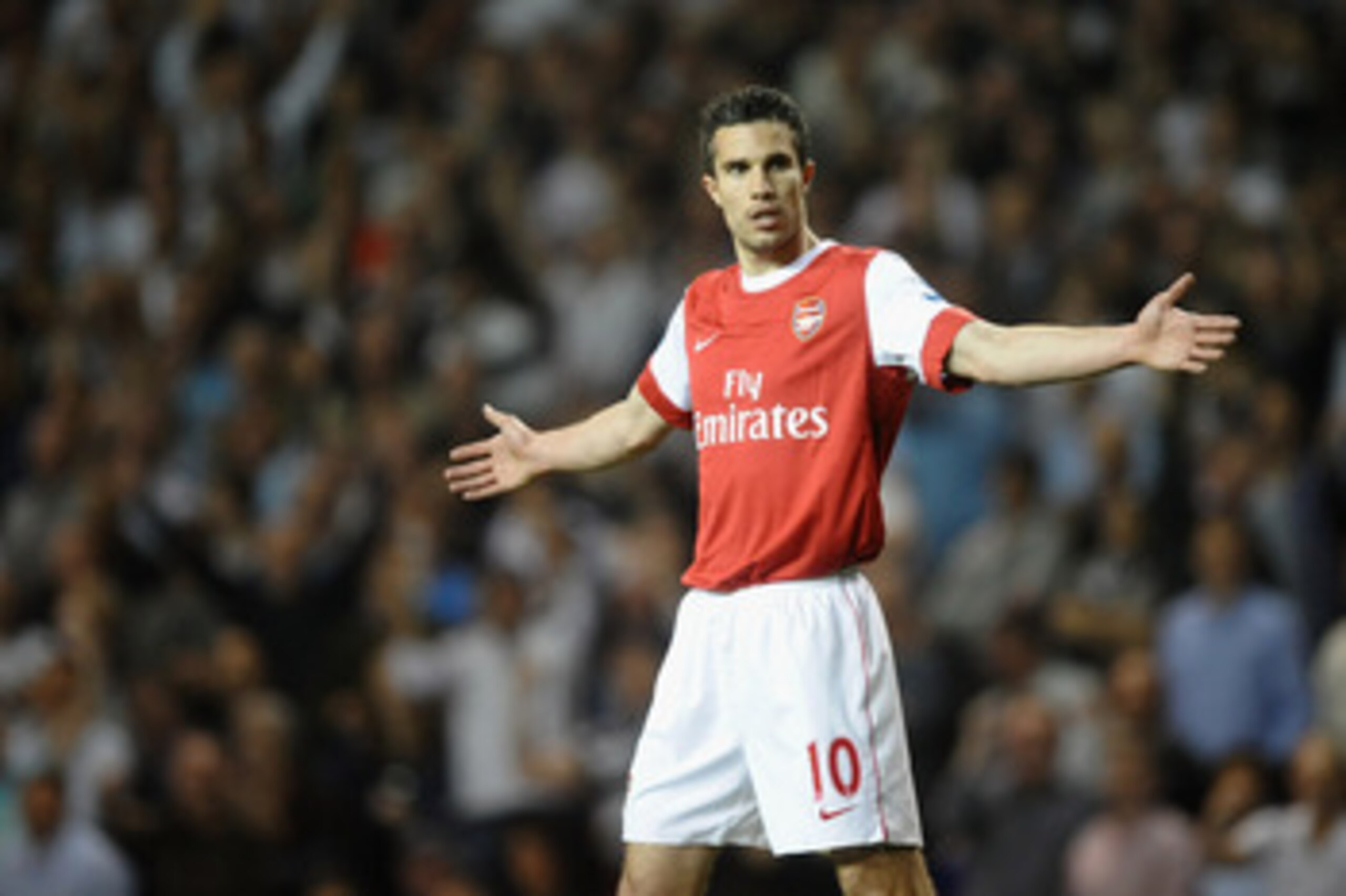 LONDON, ENGLAND - APRIL 20:  Robin van Persie of Arsenal reacts during the Barclays Premier League match between Tottenham Hotspur and Arsenal at White Hart Lane on April 20, 2011 in London, England.  (Photo by Laurence Griffiths/Getty Images)