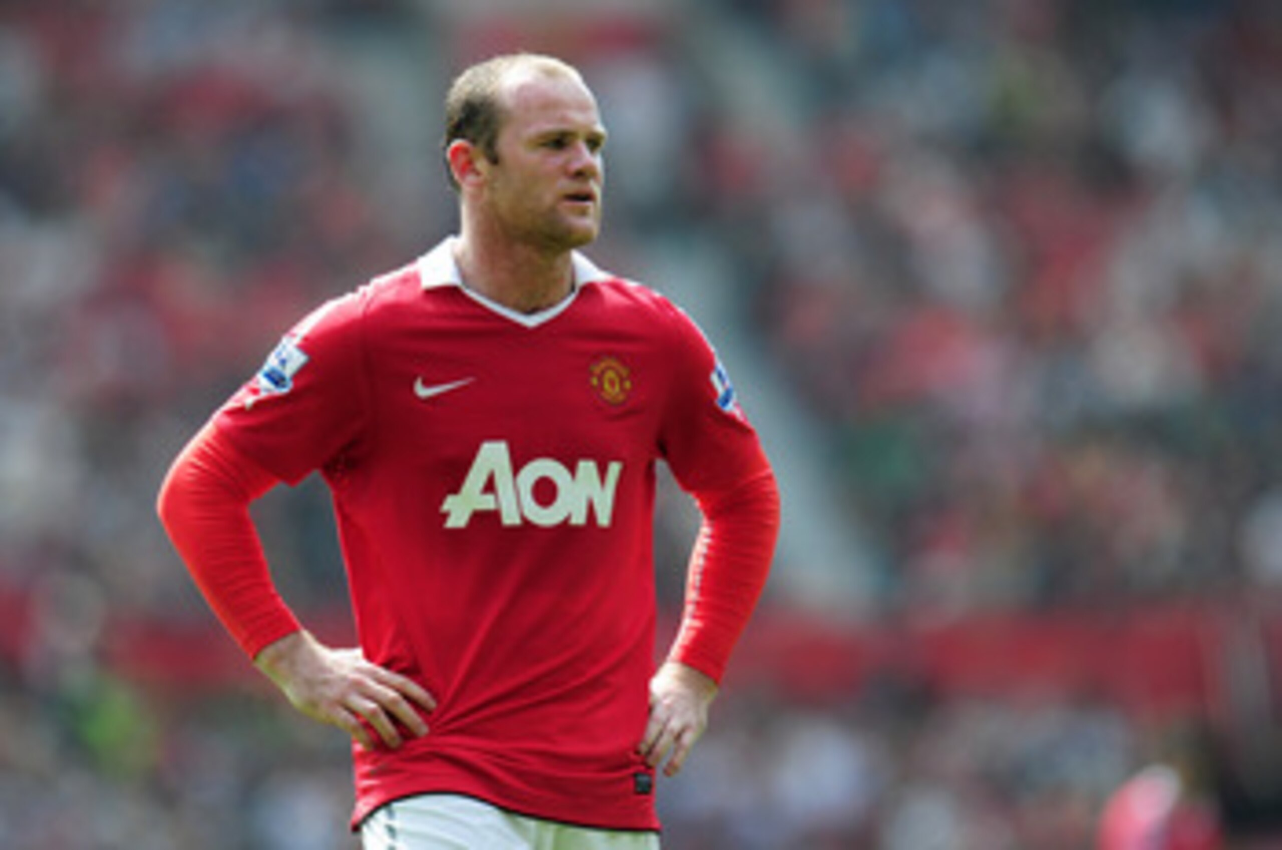 MANCHESTER, ENGLAND - APRIL 23:  Wayne Rooney of Manchester United looks dejected during the Barclays Premier League match between Manchester United and Everton at Old Trafford on April 23, 2011 in Manchester, England.  (Photo by Shaun Botterill/Getty Ima