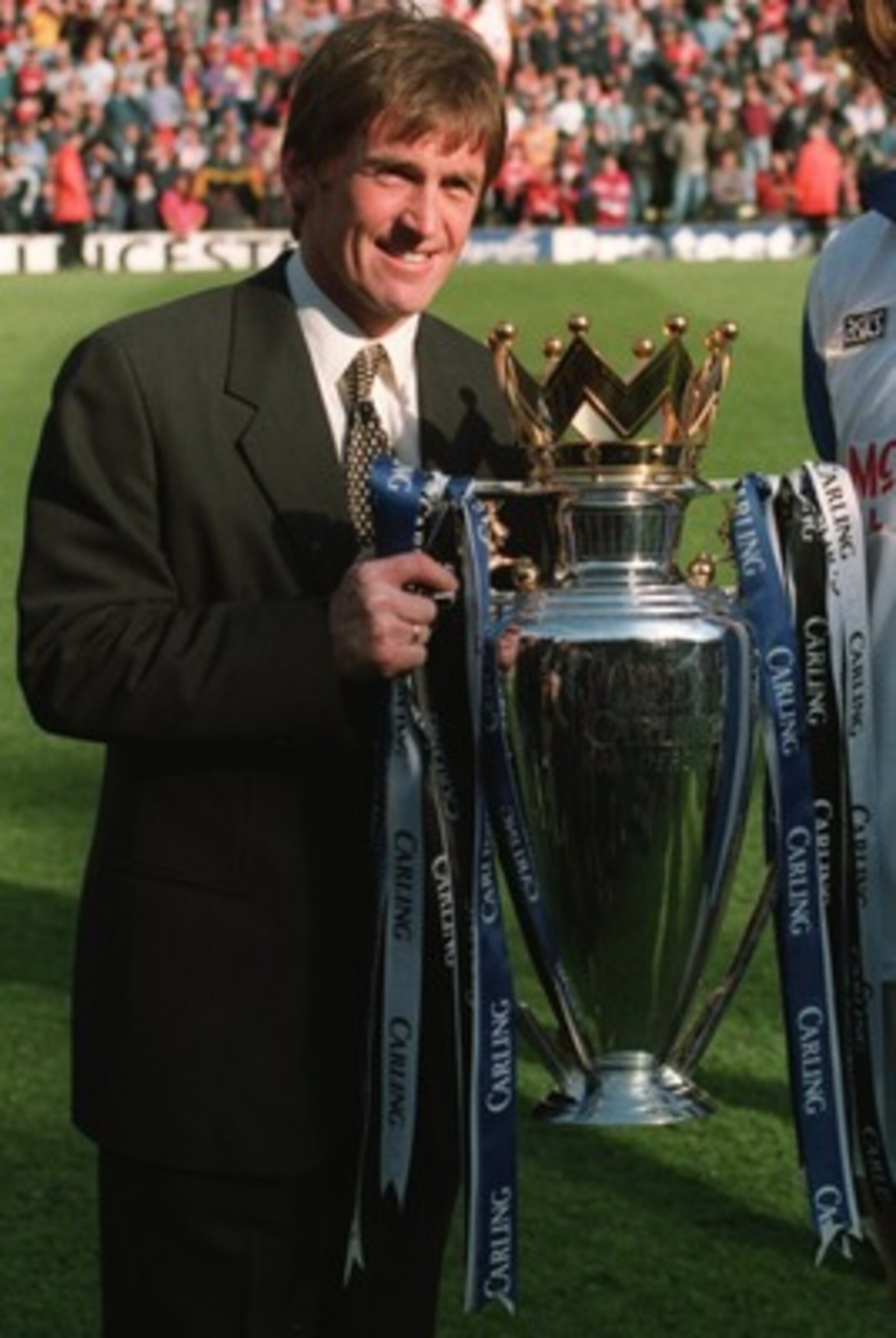 14 MAY 1995:  BLACKBURN ROVERS MANAGER KENNY DALGLISH CELEBRATES WITH THE TROPHY AFTER BLACKBURN ROVERS WIN THE FA CARLING PREMIERSHIP TROPHY DESPITE LOSING 1-2 TO LIVERPOOL IN THEIR FA PREMIERSHIP MATCH AT ANFIELD, LIVERPOOL TODAY. Mandatory Credit: Alls