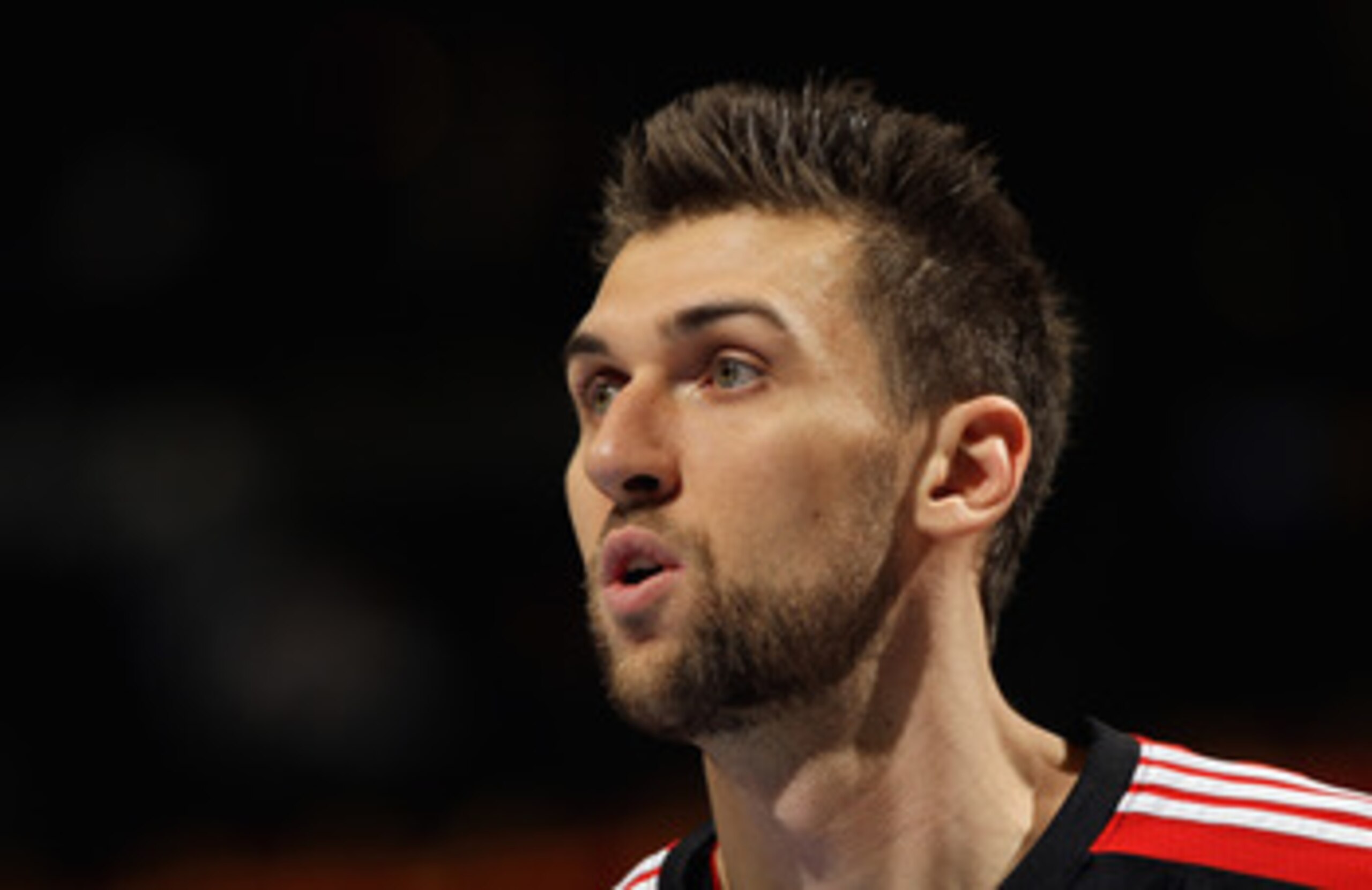 DENVER, CO - MARCH 21:  Andrea Bargnani #7 of the Toronto Raptors looks on during a break in the action against the Denver Nuggets at the Pepsi Center on March 21, 2011 in Denver, Colorado. The Nuggets defeated the Raptors 123-90. NOTE TO USER: User expre