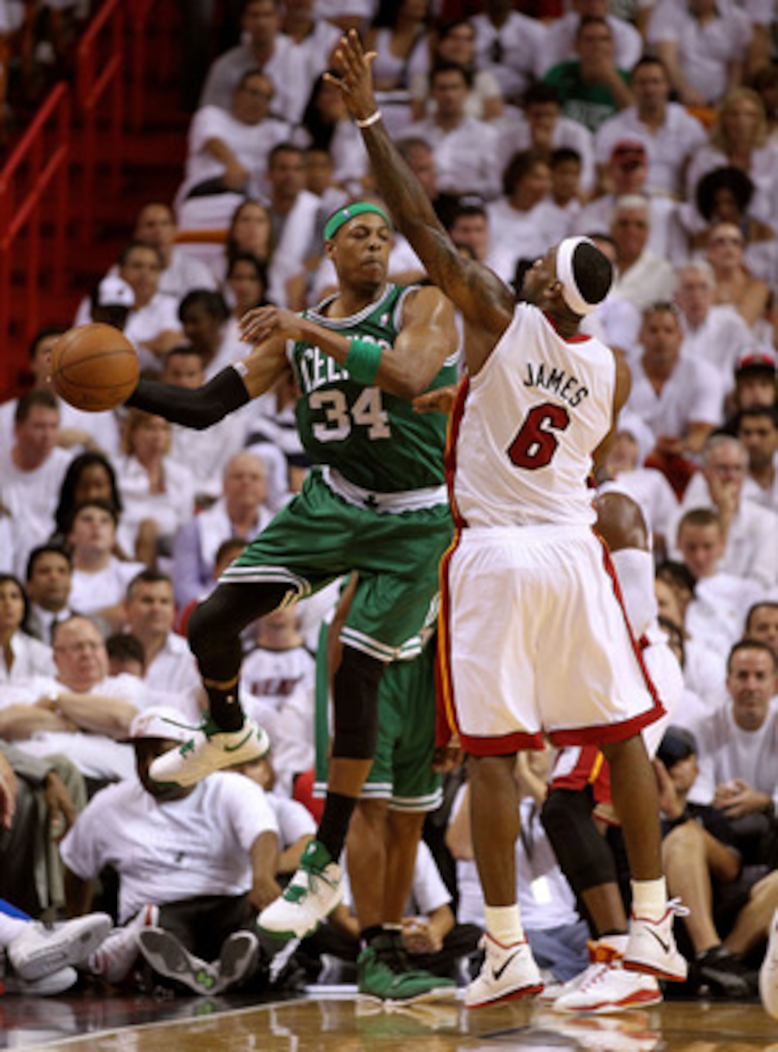 MIAMI, FL - MAY 01:  Paul Pierce #34 of the Boston Celtics passes around LeBron James #6 of the Miami Heat during game one of the Eastern Conference Semifinals of the 2011 NBA Playoffs at American Airlines Arena on May 1, 2011 in Miami, Florida. NOTE TO U