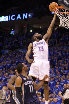 OKLAHOMA CITY, OK - MAY 03:  Guard James Harden #13 of the Oklahoma City Thunder takes a shot against Mike Conley #11 of the Memphis Grizzlies in Game Two of the Western Conference Semifinals in the 2011 NBA Playoffs on May 3, 2011 at Oklahoma City Arena 