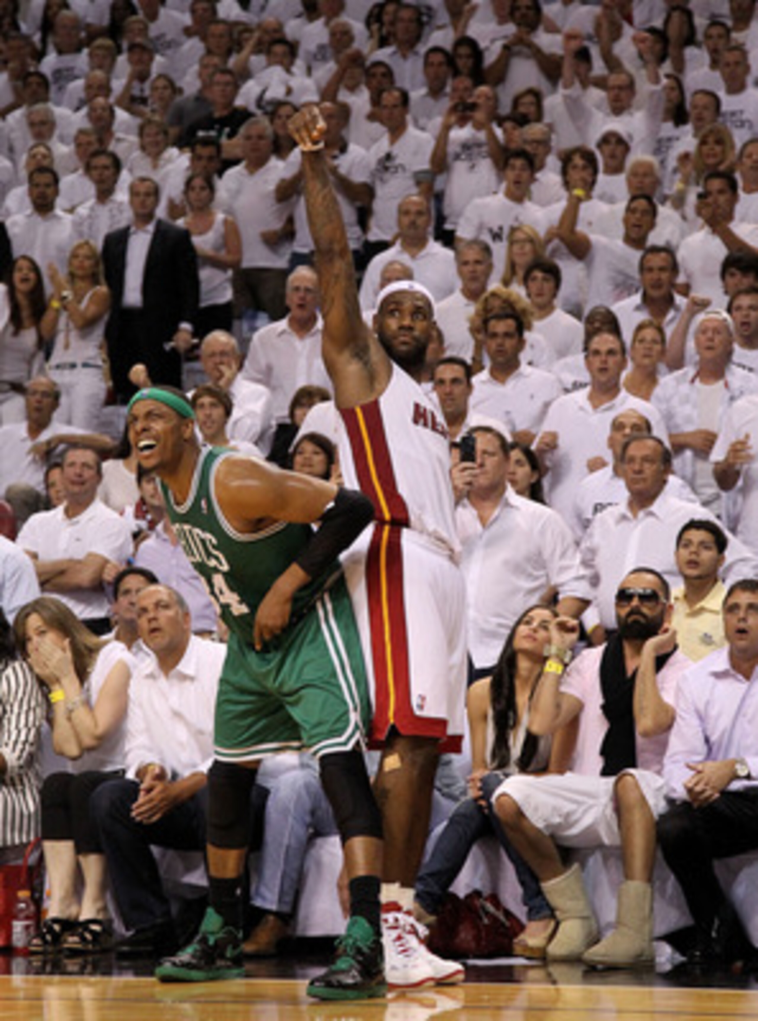 MIAMI, FL - MAY 11:  LeBron James #6 of the Miami Heat hits a late 3 pointer over Paul Pierce #34 of the Boston Celtics during Game Five of the Eastern Conference Semifinals of the 2011 NBA Playoffs at American Airlines Arena on May 11, 2011 in Miami, Flo