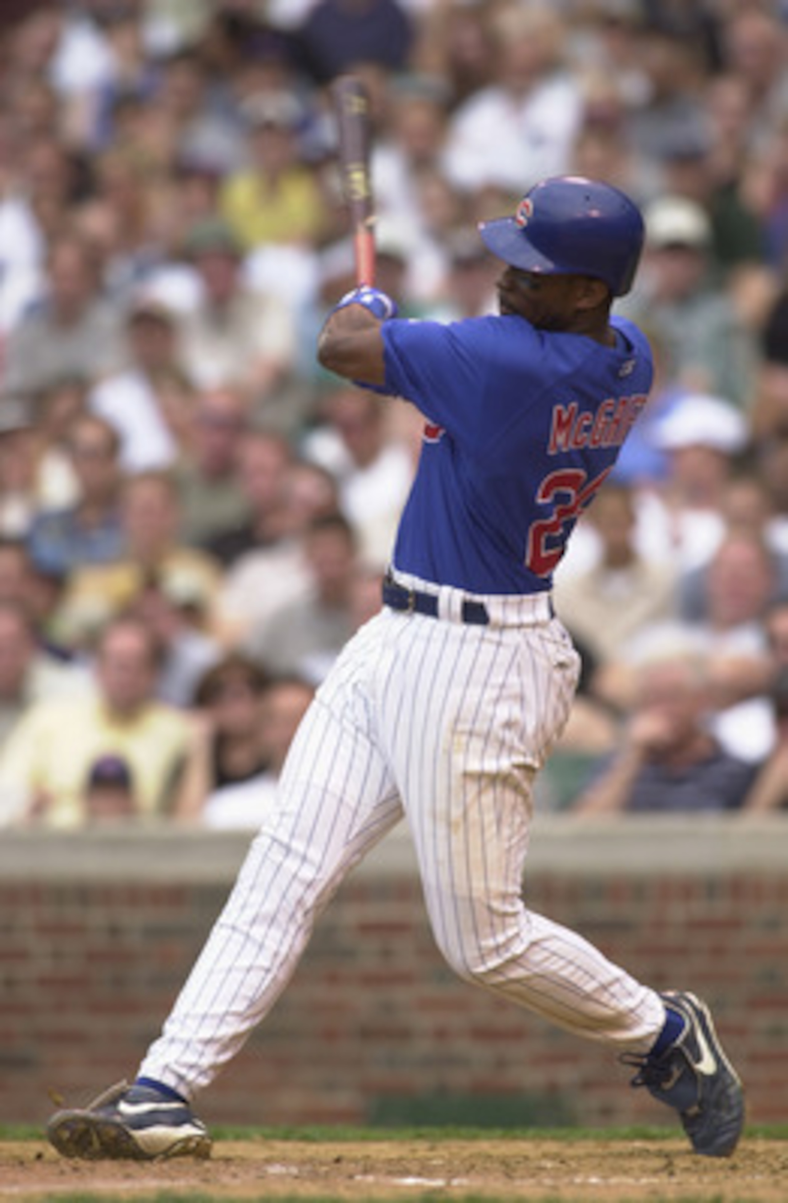 CHICAGO - MAY 31:  First baseman Fred McGriff #29 of the Chicago Cubs swings the bat during the MLB game against the Houston Astros at Wrigley Field in Chicago, Illinois on May 31, 2002. The Astros defeated the Cubs 4-1. (Photo by Jonathan Daniel/Getty Im