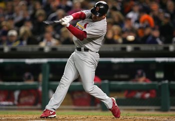 DETROIT - OCTOBER 21:  Jim Edmonds #15 of the St. Louis Cardinals strikes out swinging to leadoff the top of the second inning against the Detroit Tigers during Game One of 2006 World Series October 21, 2006 at Comerica Park in Detroit Michigan.  (Photo b