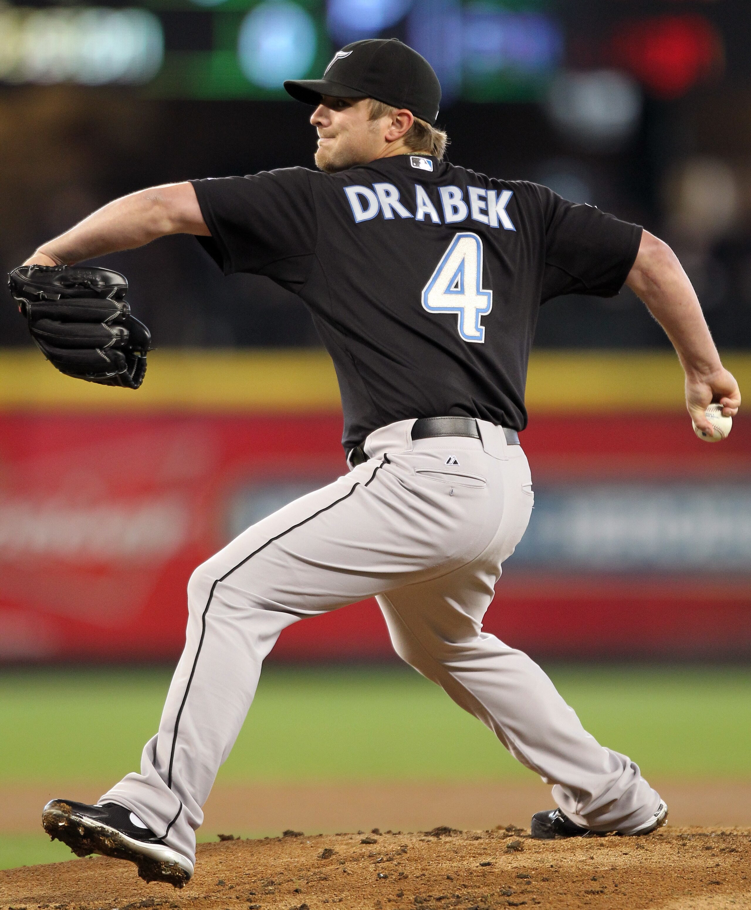SEATTLE, WA - APRIL 13:  Starting pitcher Kyle Drabek #4 of the Toronto Blue Jays pitches against the Seattle Mariners at Safeco Field on April 13, 2011 in Seattle, Washington. (Photo by Otto Greule Jr/Getty Images)