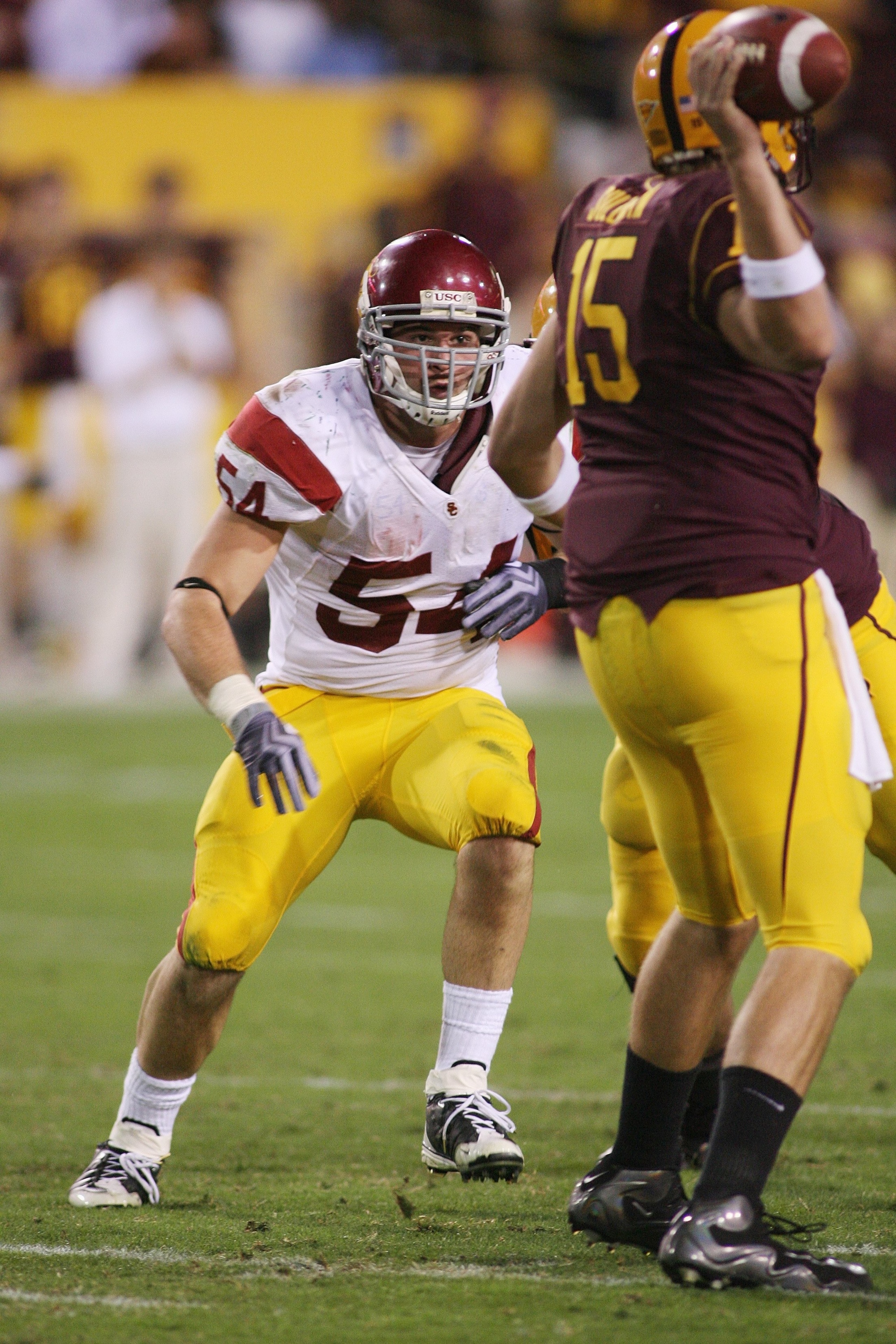 TEMPE, AZ - NOVEMBER 7:  Chris Galippo #54 of the USC Trojans rushes quarterback Danny Sullivan #15 of the Arizona State Sun Devils on November 7, 2009 at Sun Devil Stadium in Tempe, Arizona.  USC won 14-9.  (Photo by Jeff Golden/Getty Images)