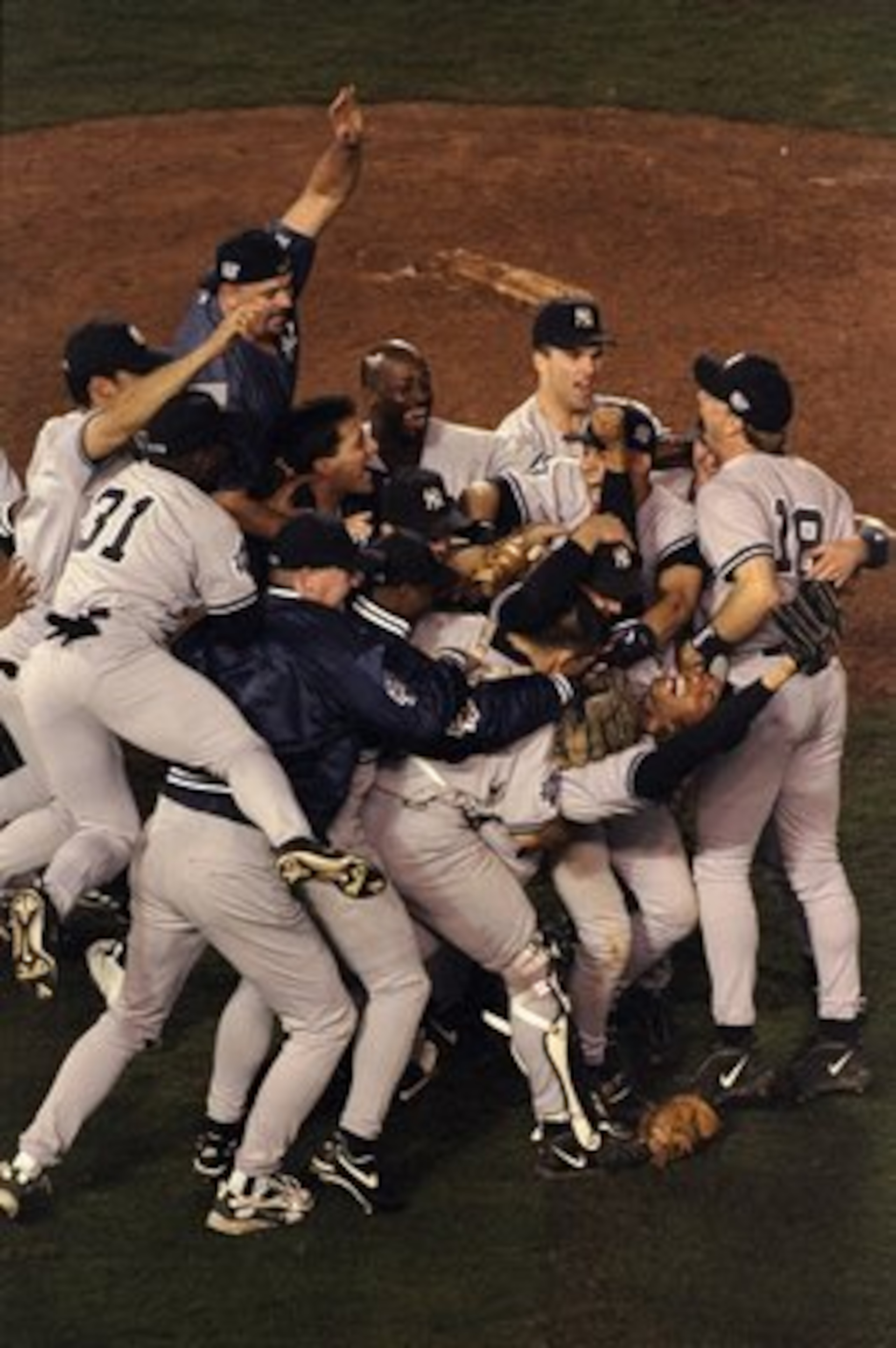 21 Oct 1998:  General view as members of the New York Yankees celebrate winning the 1998 World Series Game 4 against the San Diego Padres at the Qualcomm Stadium in San Diego, California. The Yankees defeated the Padres 3-0 to win the Series. Mandatory Cr