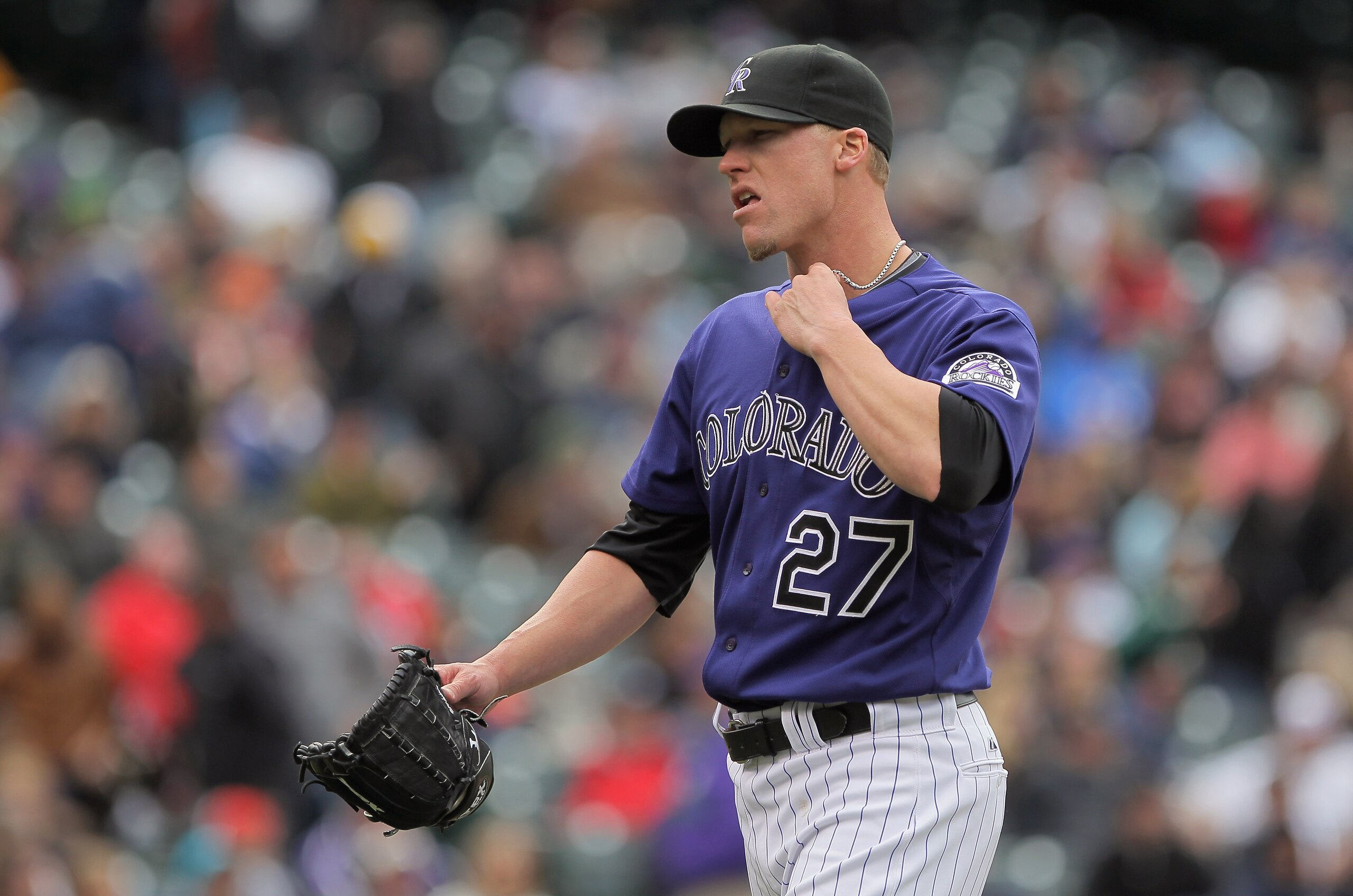 DENVER, CO - MAY 01:  Relief pitcher Matt Lindstrom #27 of the Colorado Rockies works against the Pittsburgh Pirates in the seventh inning at Coors Field on May 1, 2011 in Denver, Colorado. The Pirates defeated the Rockies 8-4.  (Photo by Doug Pensinger/G