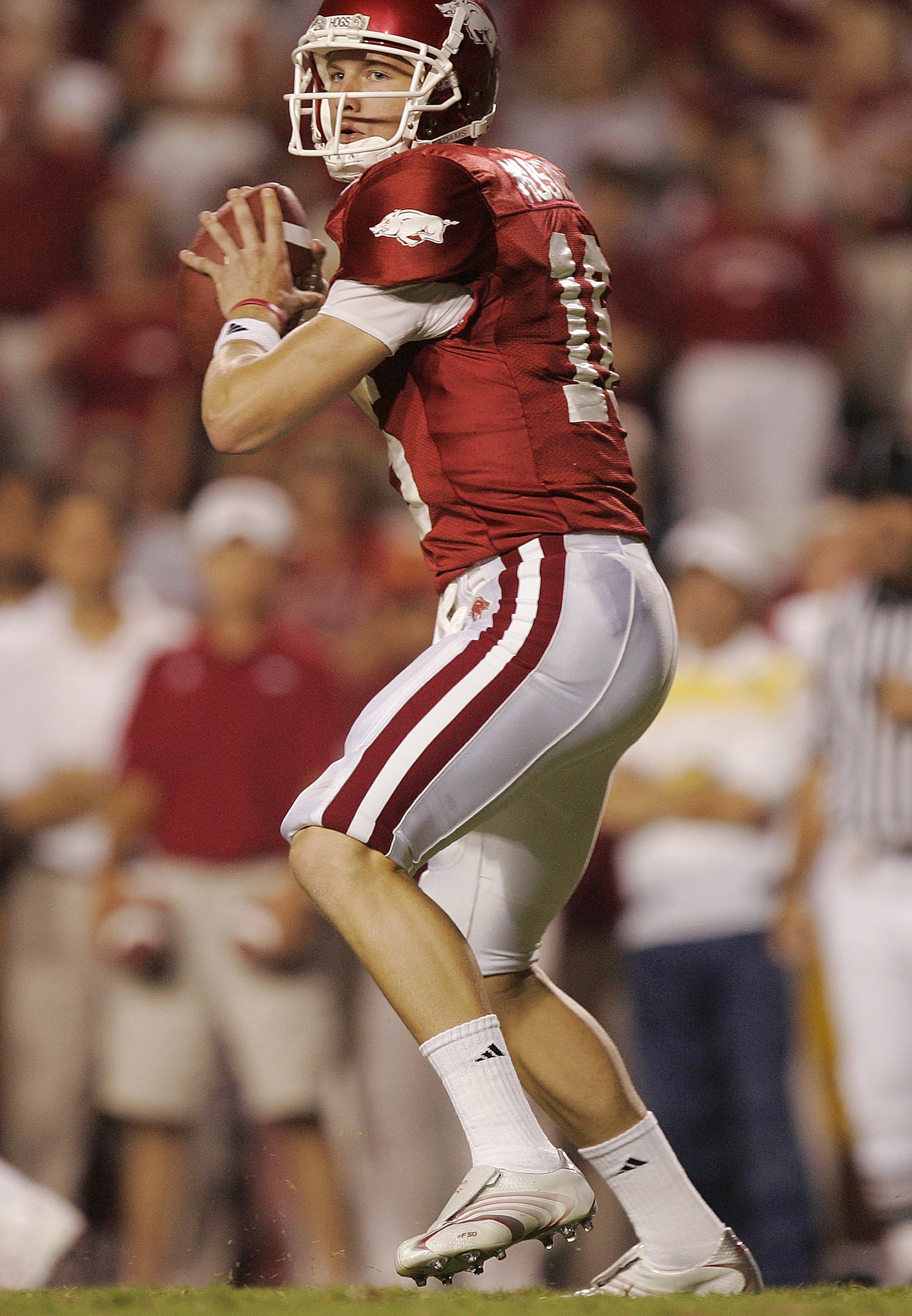 FAYETTEVILLE, AR - SEPTEMBER 2:  Mitch Mustain #16 of the Arkansas Razorbacks passes against the University of Southern California Trojans on September 2, 2006 at Donald W. Reynolds Razorback Stadium in Fayetteville, Arkansas.  Southern California won 50-