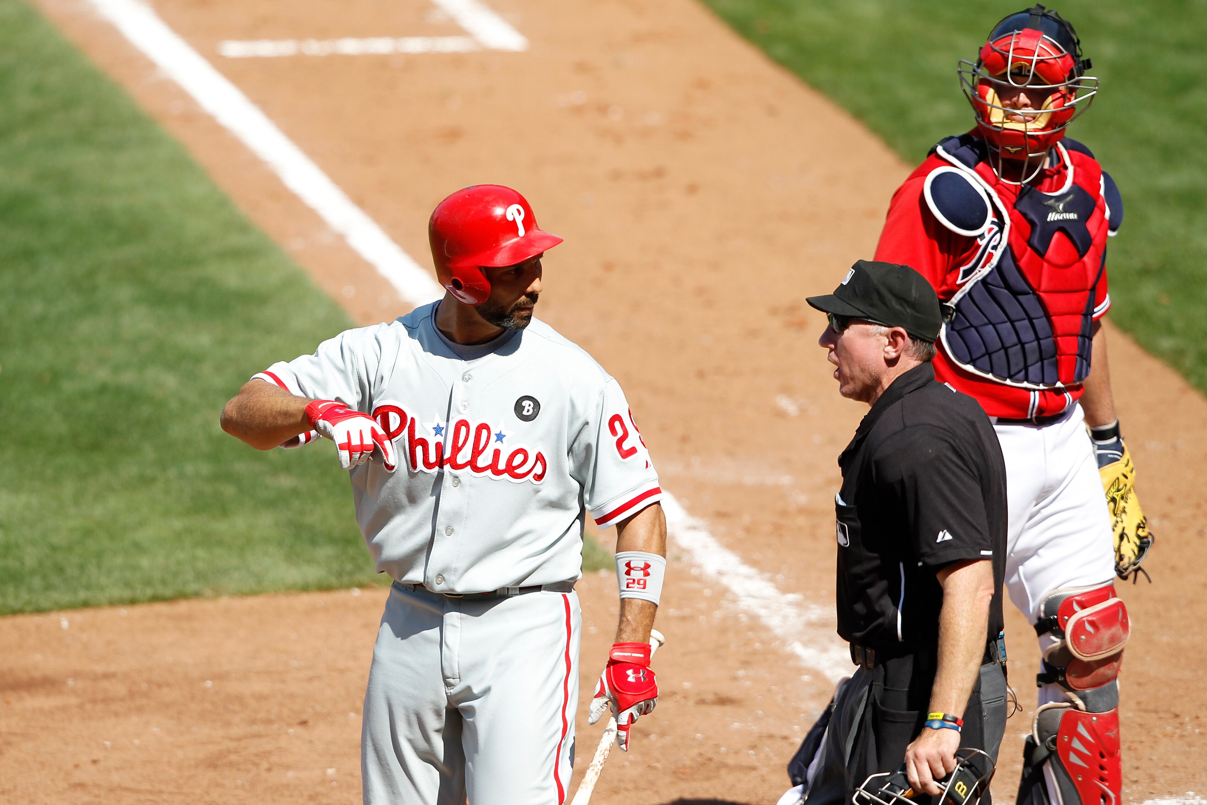 ATLANTA, GA - APRIL 10: Raul Ibanez #29 of the Philadelphia Phillies argues with home plate umpire Lance Barksdale after being called out on strikes against the Atlanta Braves at Turner Field on April 10, 2011 in Atlanta, Georgia. The Phillies won 3-0. (P