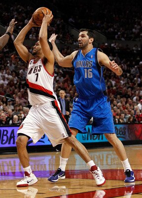 PORTLAND, OR - APRIL 23:  Brandon Roy #7 of the Portland Trail Blazers goes for a lay up agianst Peja Stojakovic #16 of the Dallas Mavericks in Game Four of the Western Conference Quarterfinals in the 2011 NBA Playoffs on April 23, 2011 at the Rose Garden
