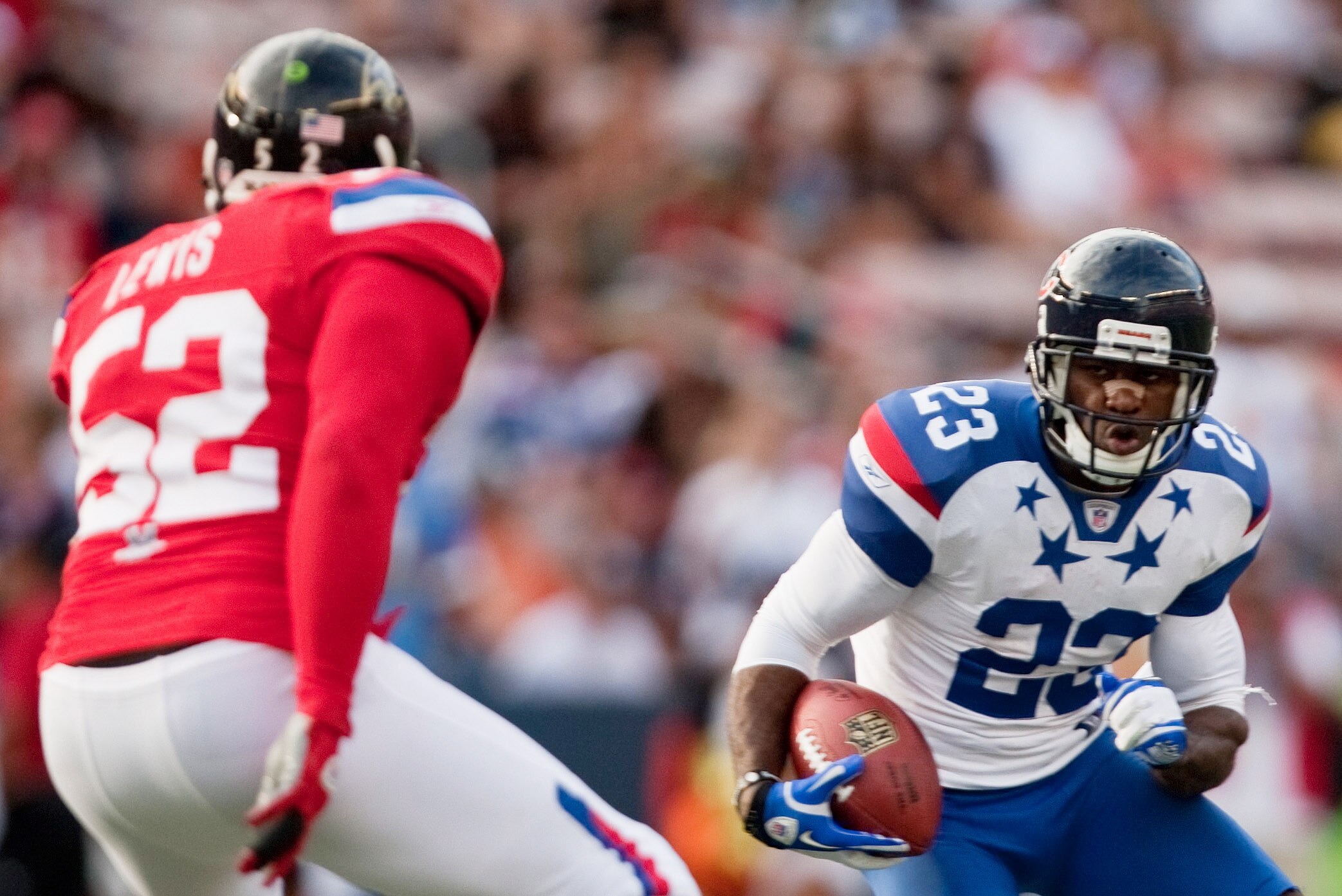 HONOLULU - JANUARY 30:  Devin Hester #23 of the Chicago Bears runs the ball downfield against the American Football Conference (AFC) during the 2011 NFL Pro Bowl at Aloha Stadium on January 30, 2011 in Honolulu, Hawaii.  (Photo by Kent Nishimura/Getty Ima