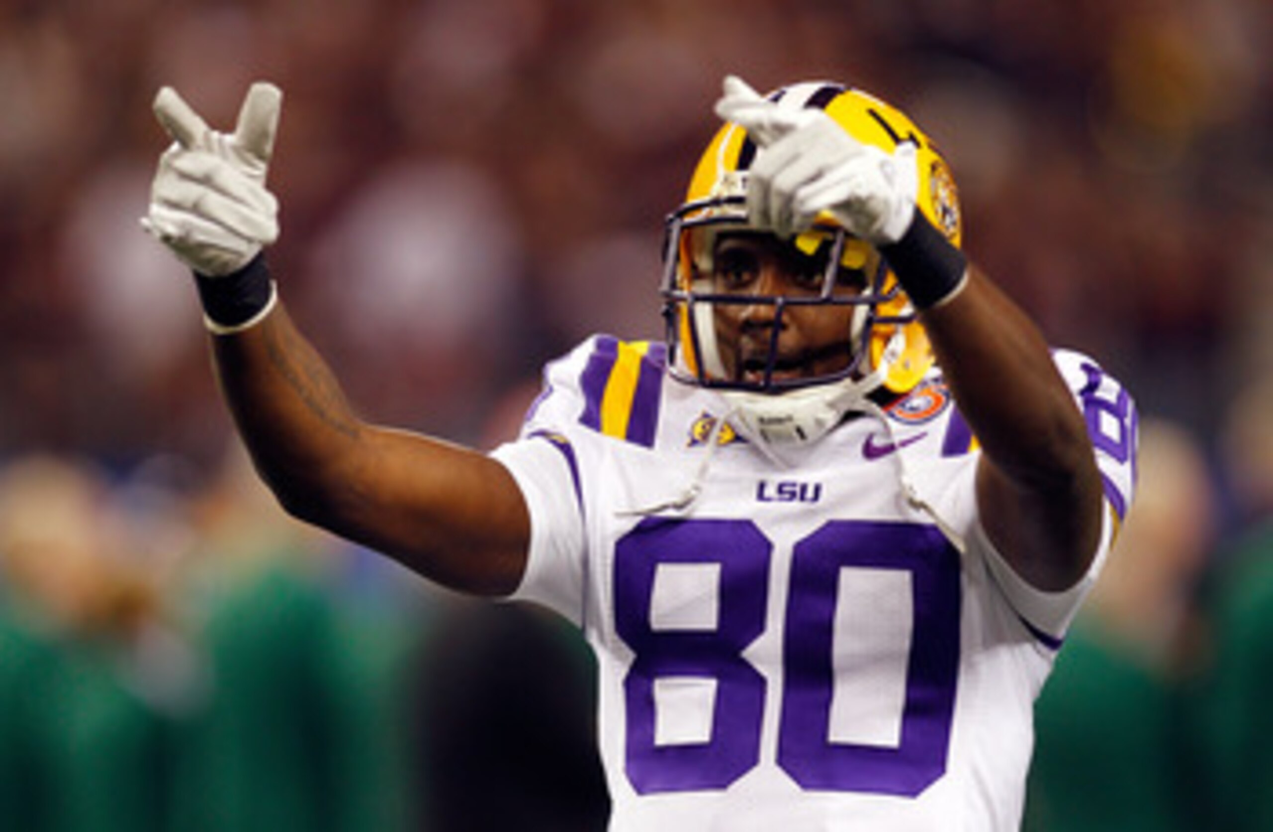 ARLINGTON, TX - JANUARY 07: Terrence Toliver #80 of the Louisiana State University Tigers points to the crowd during pregame before playing the Texas A&M Aggies during the AT&T Cotton Bowl at Cowboys Stadium on January 7, 2011 in Arlington, Texas. (Phot ARLINGTON, TX - JANUARY 07: Terrence Toliver #80 of the Louisiana State University Tigers points to the crowd during pregame before playing the Texas A&M Aggies during the AT&T Cotton Bowl at Cowboys Stadium on January 7, 2011 in Arlington, Texas. (Phot