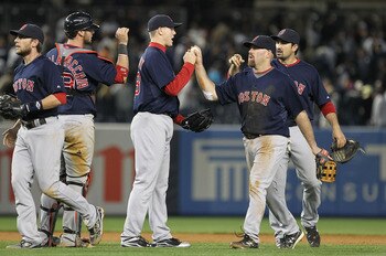 NEW YORK, NY - MAY 13:  Jonathan Papelbon #58 and Kevin Youkilis #20 of the Boston Red Sox celebrate a 5-4 win against the New York Yankees on May 13, 2011 at Yankee Stadium in the Bronx borough of New York City.  (Photo by Al Bello/Getty Images)