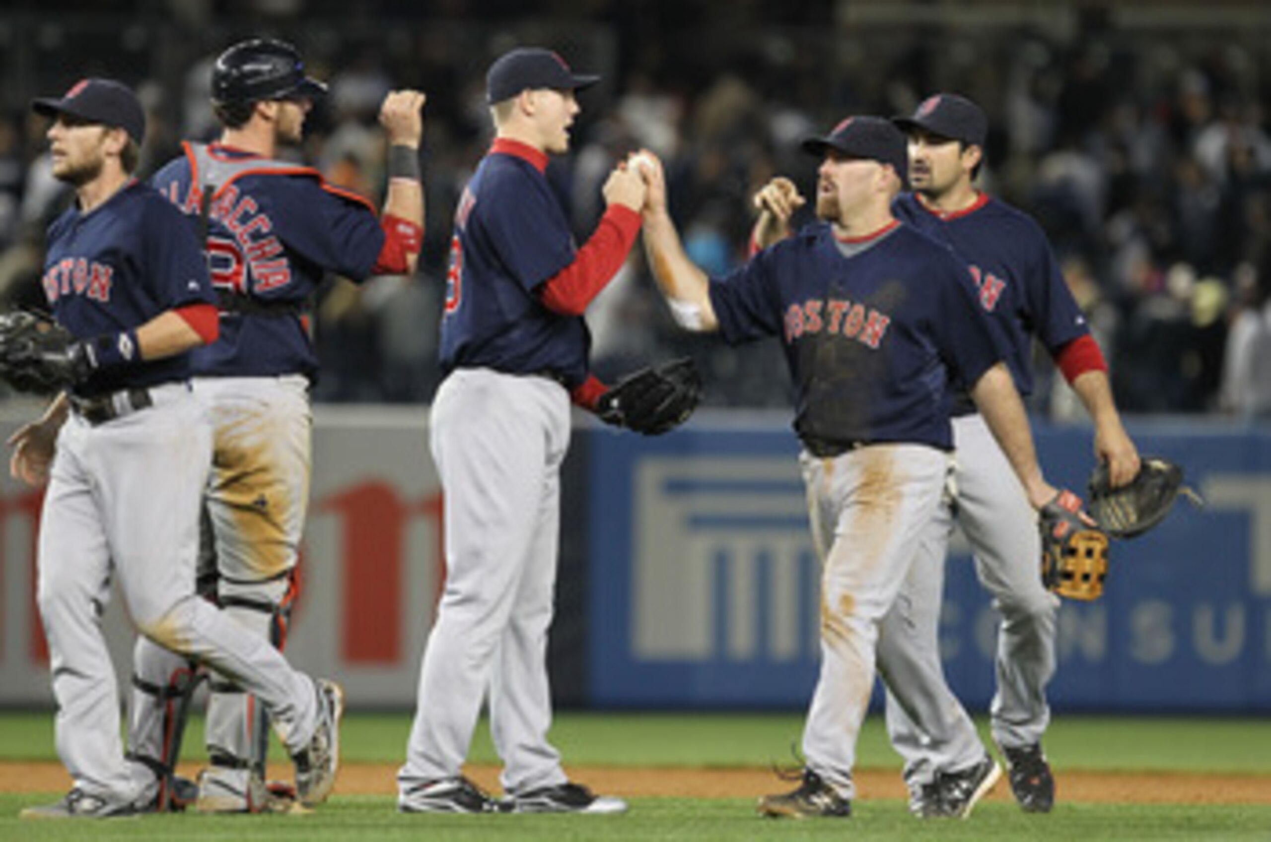 NEW YORK, NY - MAY 13: Jonathan Papelbon #58 and Kevin Youkilis #20 of the Boston Red Sox celebrate a 5-4 win against the New York Yankees on May 13, 2011 at Yankee Stadium in the Bronx borough of New York City. (Photo by Al Bello/Getty Images) NEW YORK, NY - MAY 13: Jonathan Papelbon #58 and Kevin Youkilis #20 of the Boston Red Sox celebrate a 5-4 win against the New York Yankees on May 13, 2011 at Yankee Stadium in the Bronx borough of New York City. (Photo by Al Bello/Getty Images)