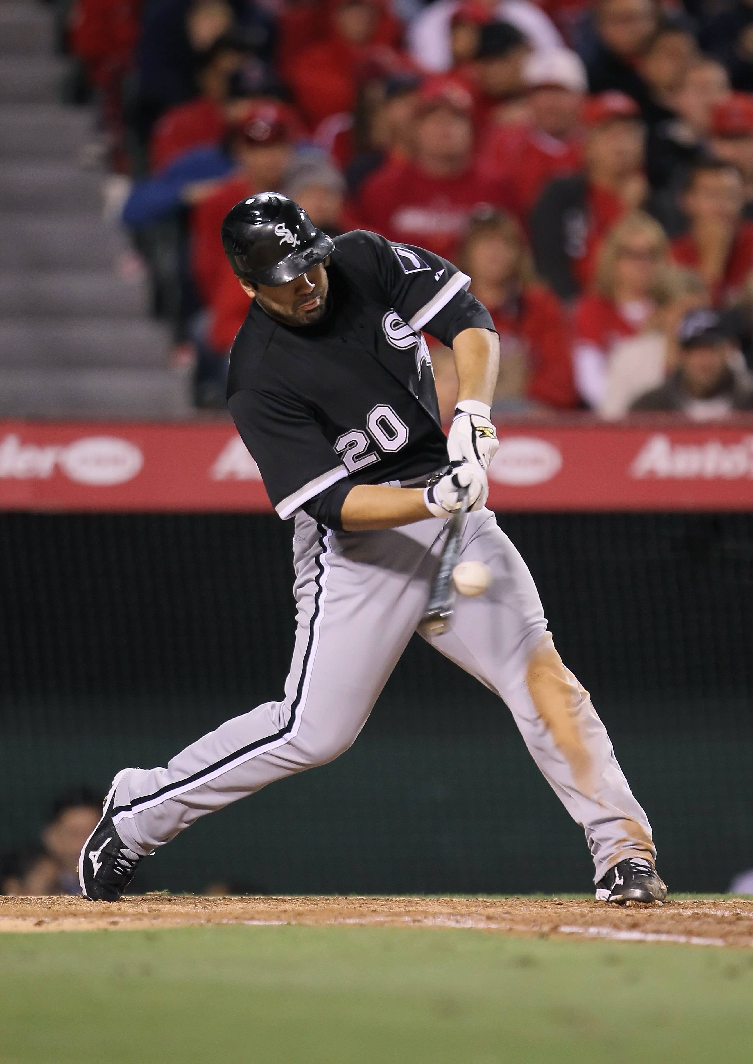 ANAHEIM, CA - MAY 09:  Carlos Quentin #20 of the Chicago White Sox hits an RBI double against the Los Angeles Angels of Anaheim in the fifth inning at Angel Stadium of Anaheim on May 9, 2011 in Anaheim, California.  (Photo by Jeff Gross/Getty Images)