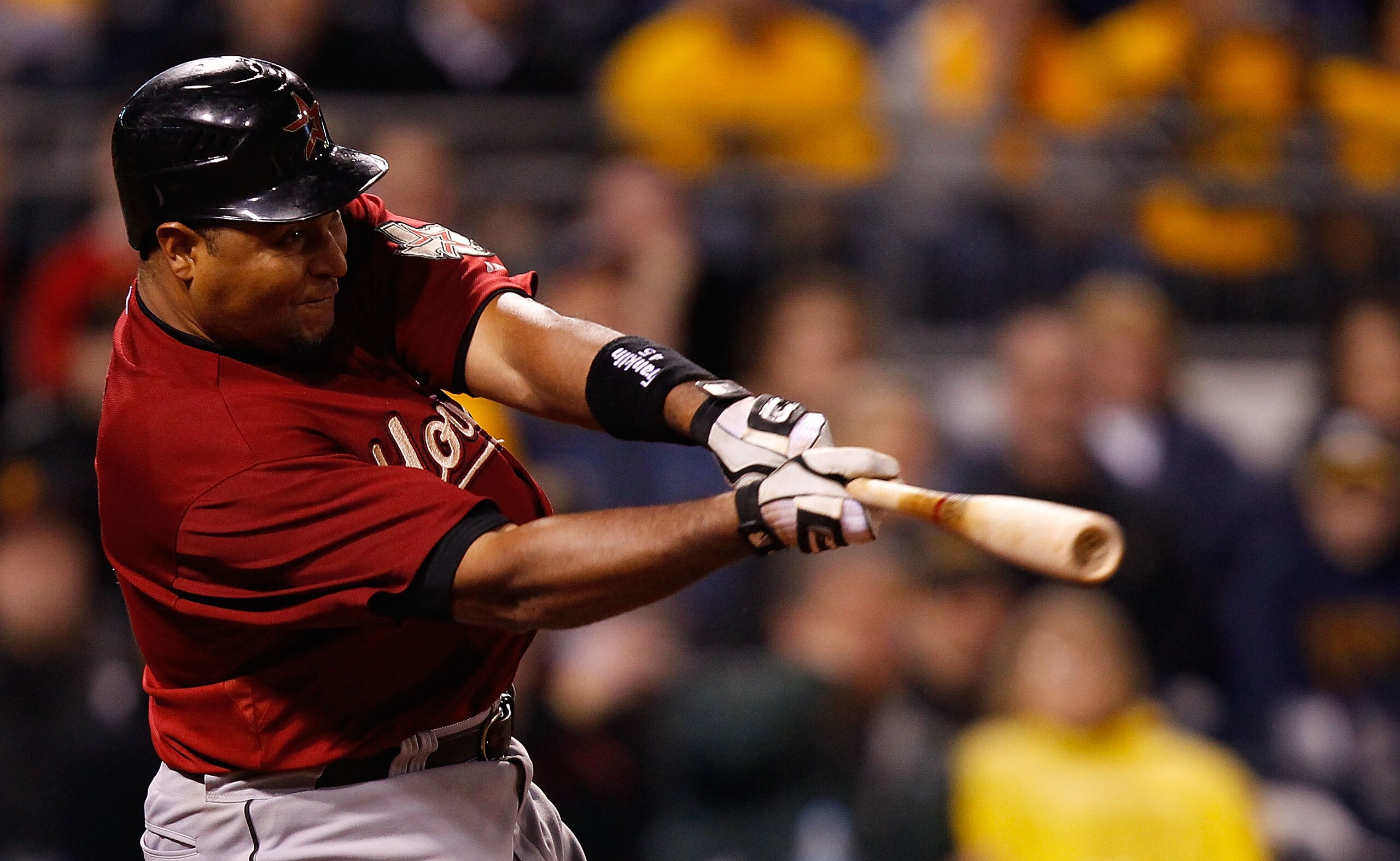 PITTSBURGH - MAY 06: Carlos Lee #45 of the Houston Astros hits an RBI double in the 8th inning against the Pittsburgh Pirates during the game on May 6, 2011 at PNC Park in Pittsburgh, Pennsylvania.  (Photo by Jared Wickerham/Getty Images)