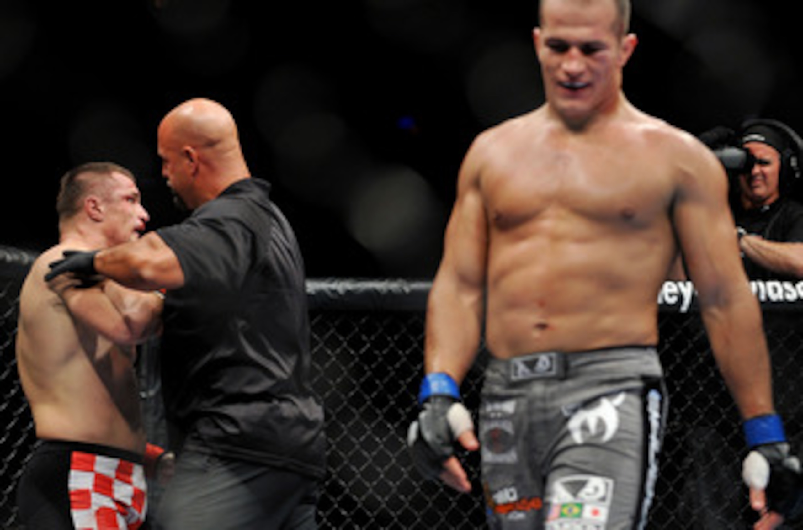 DALLAS - SEPTEMBER 19:  UFC fighter Mirko Cro Cop (L) is stopped by referee after losing to opponent UFC fighter Junior Dos Santo (R) during their Heavyweight bout at UFC 103: Franklin vs. Belfort at the American Airlines Center on September 19, 2009 in D