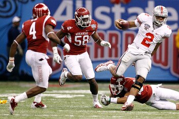 NEW ORLEANS, LA - JANUARY 04:  Quarterback Terrelle Pryor #2 of the Ohio State Buckeyes looks to run against the Arkansas Razorbacks during the Allstate Sugar Bowl at the Louisiana Superdome on January 4, 2011 in New Orleans, Louisiana.  (Photo by Chris G