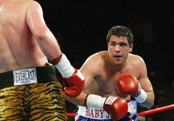 LAS VEGAS - MARCH 13:  Joe Mesi (right) battles Vassiliy Jirov during the heavyweight bout at Mandalay Bay Resort & Casino on March 13, 2004 in Las Vegas, Nevada. Mesi defeated Jirov by unanimous decision. (Photo by Jed Jacobsohn/Getty Images)