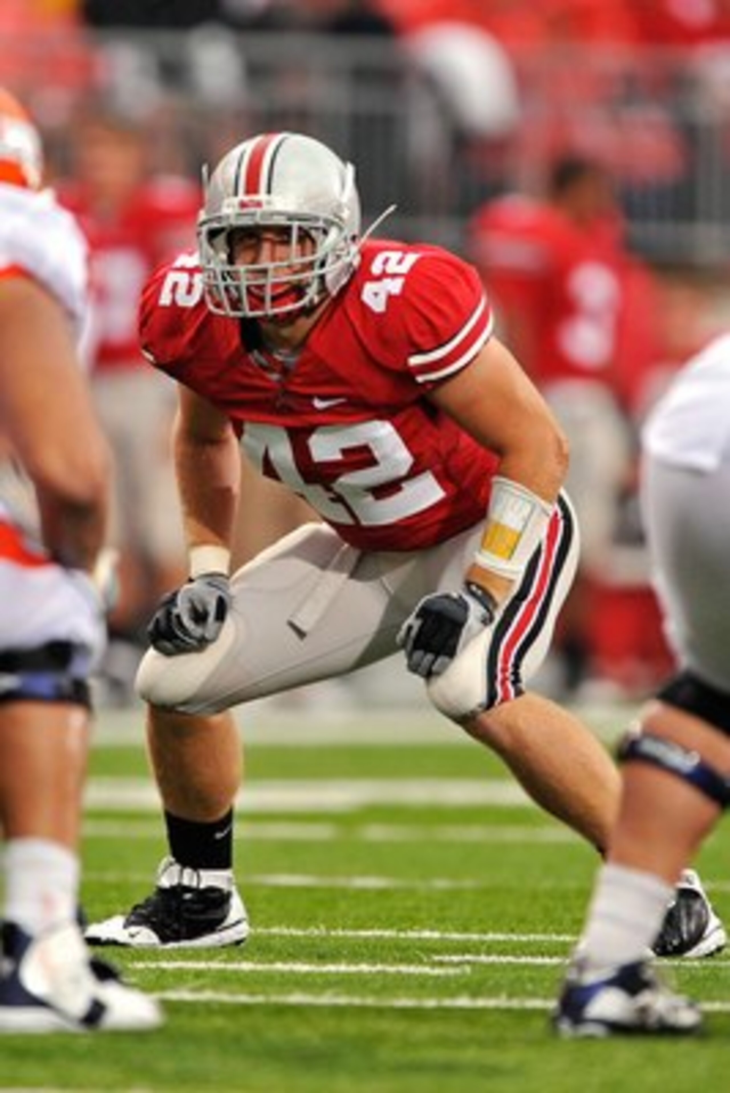 COLUMBUS, OH - SEPTEMBER 26: Linebacker Andrew Sweat #42 of the Ohio State Buckeyes waits for the snap against the Illinois Fighting Illini at Ohio Stadium on September 26, 2009 in Columbus, Ohio.  (Photo by Jamie Sabau/Getty Images)